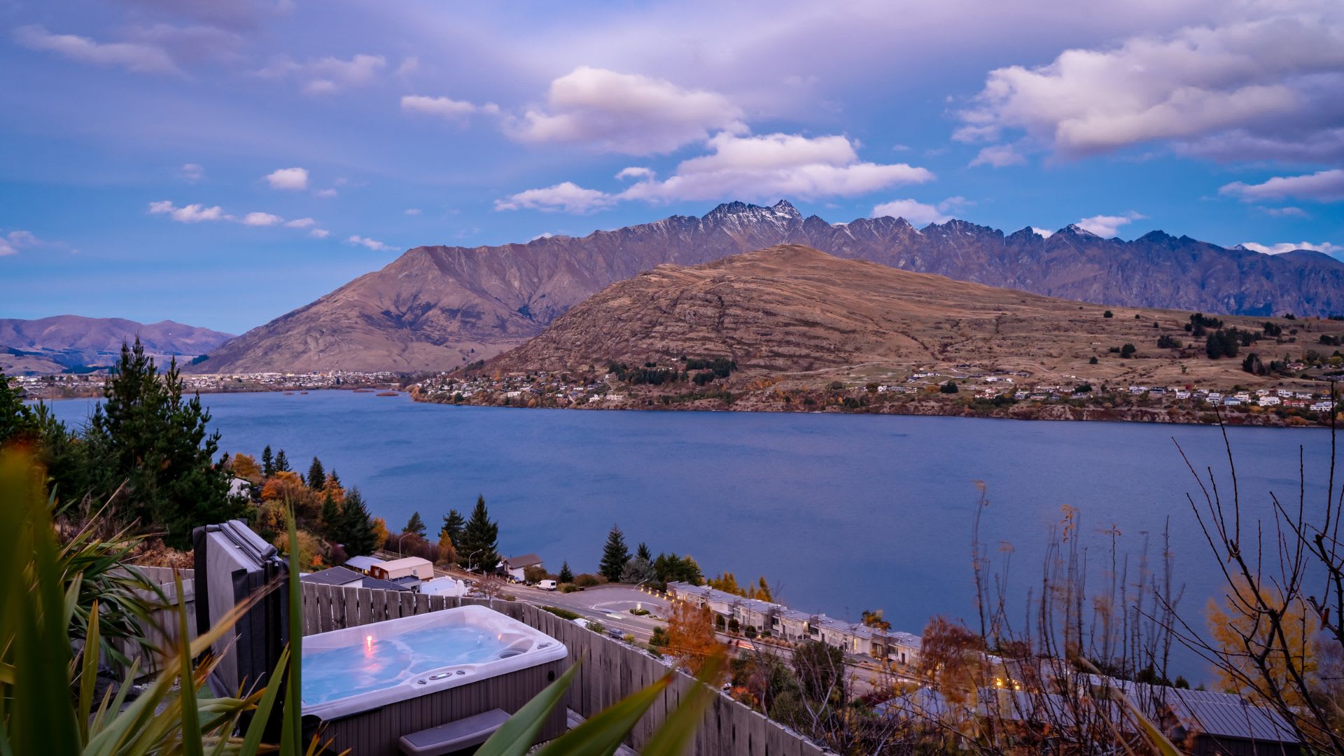 Warm up in the hot tub in your own Queenstown spa retreat