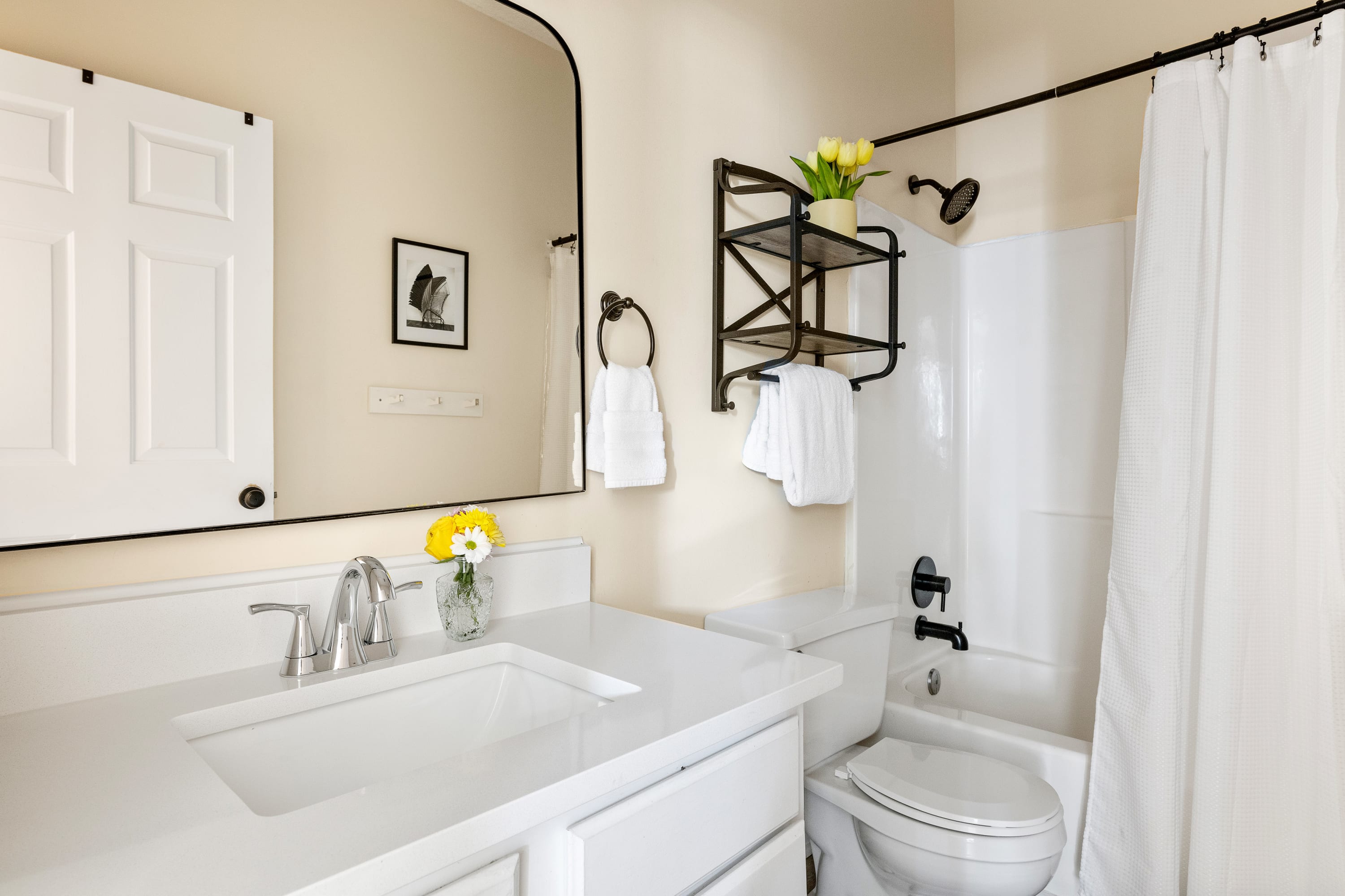 Full Bathroom with a shower/tub combo