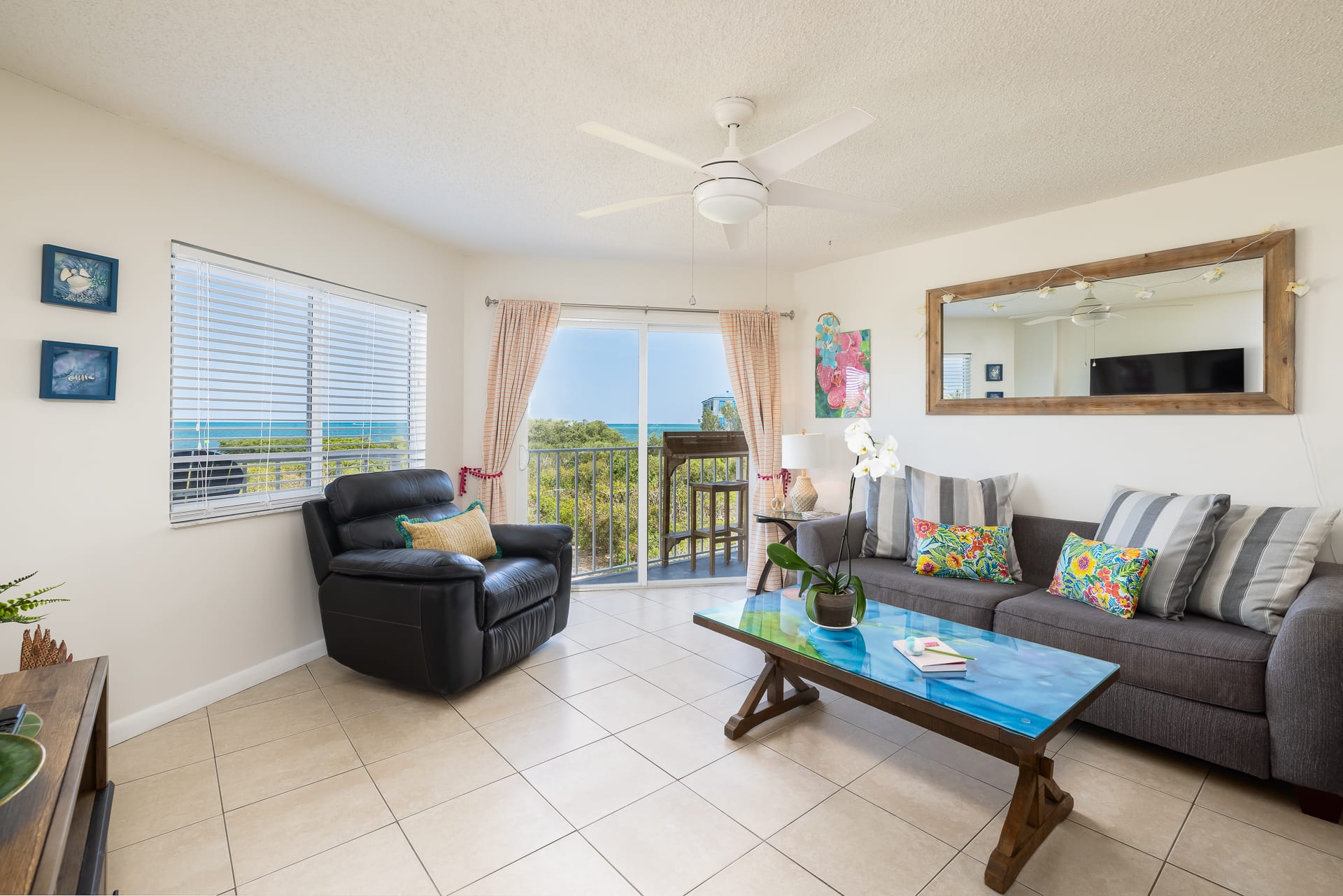 Living room with ocean and marina view