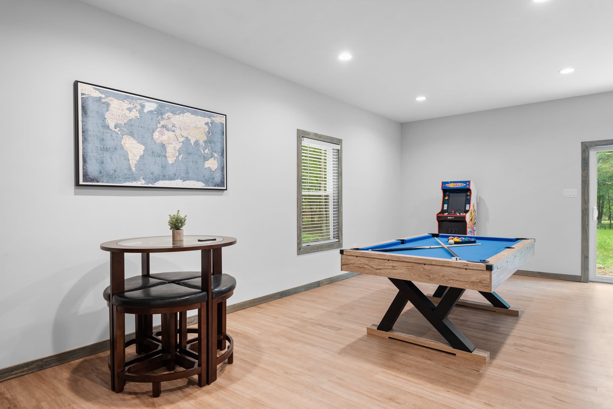 A fun little corner of the house where friendly competition happens. Whether it's pool or a quick game of pac-man, this space is made for laughter and good times.