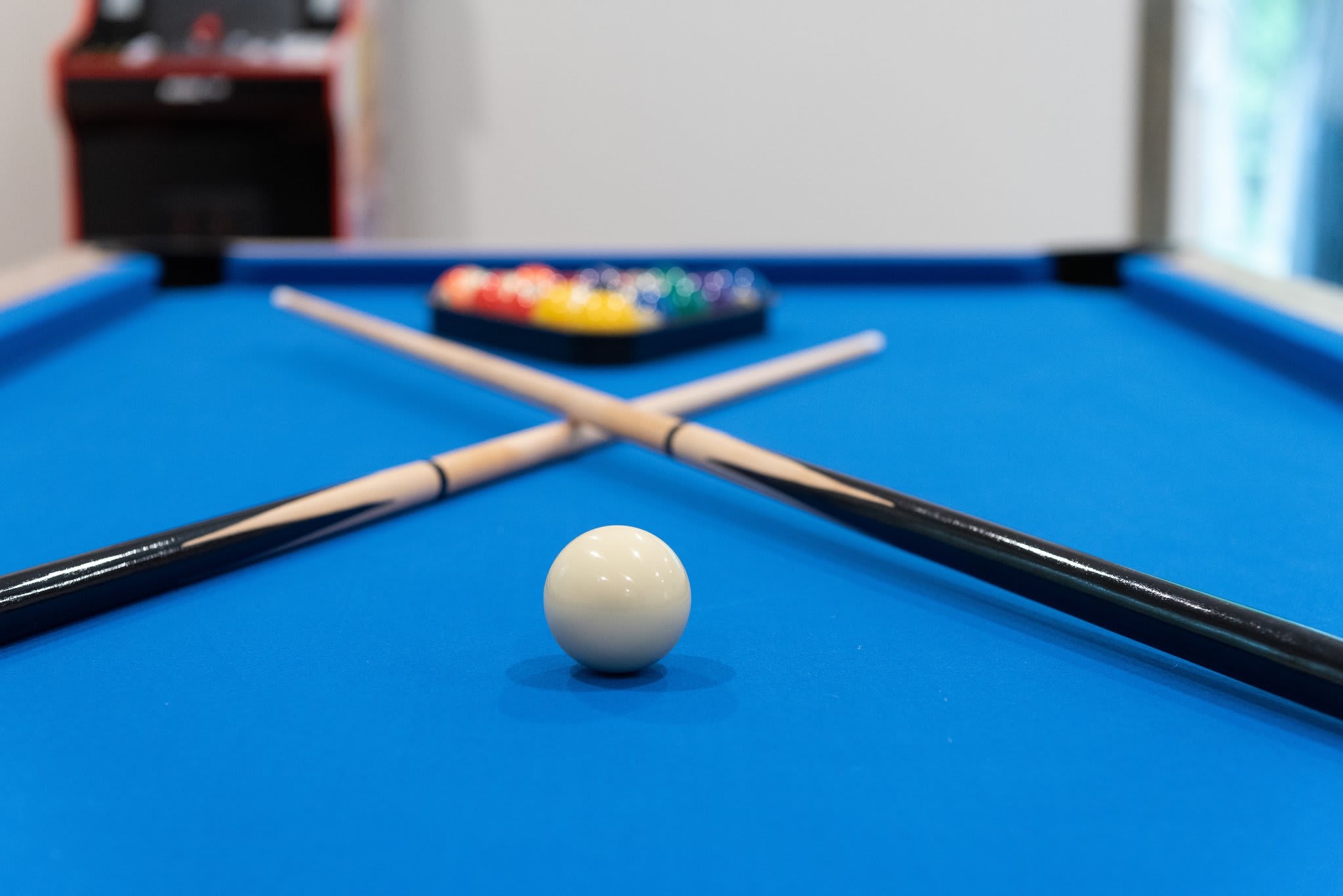 Pool Table Close-Up – The details speak for themselves, fresh felt, smooth cues, and that satisfying break shot waiting to happen.