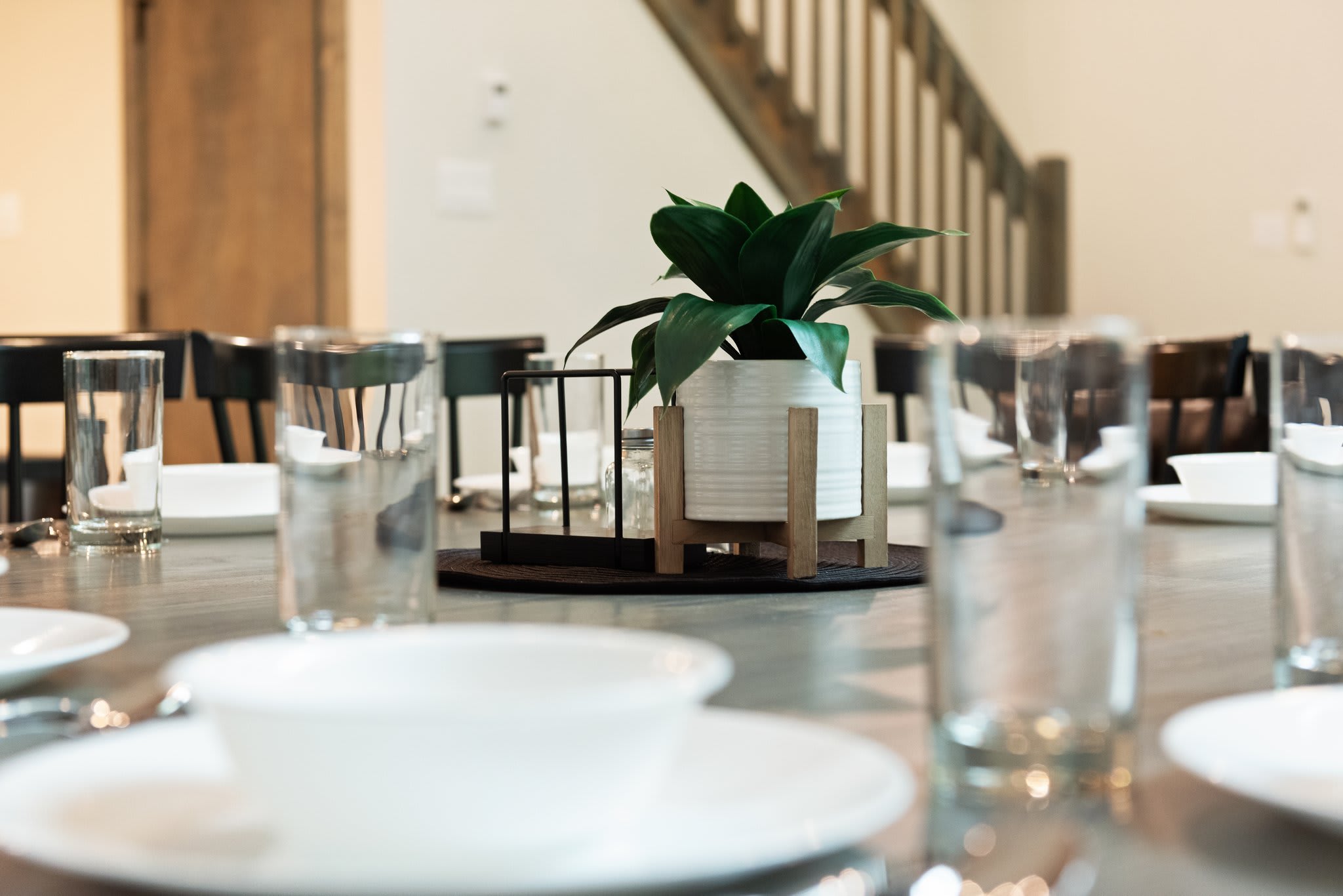 Thoughtfully styled for connection and comfort, the large dining table offers space for everyone to gather and enjoy.