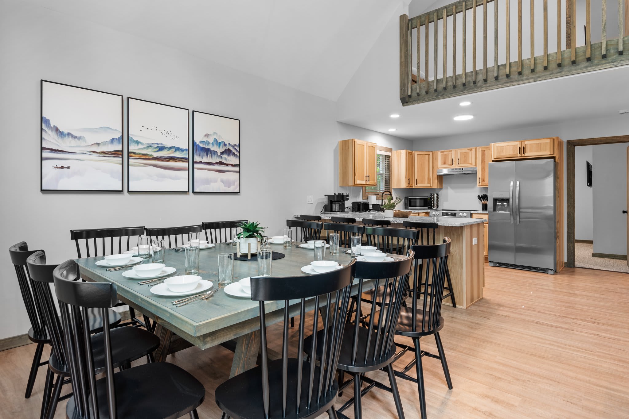 This open dining space flows into the kitchen and beyond, making it ideal for entertaining or simply spreading out with family and friends.