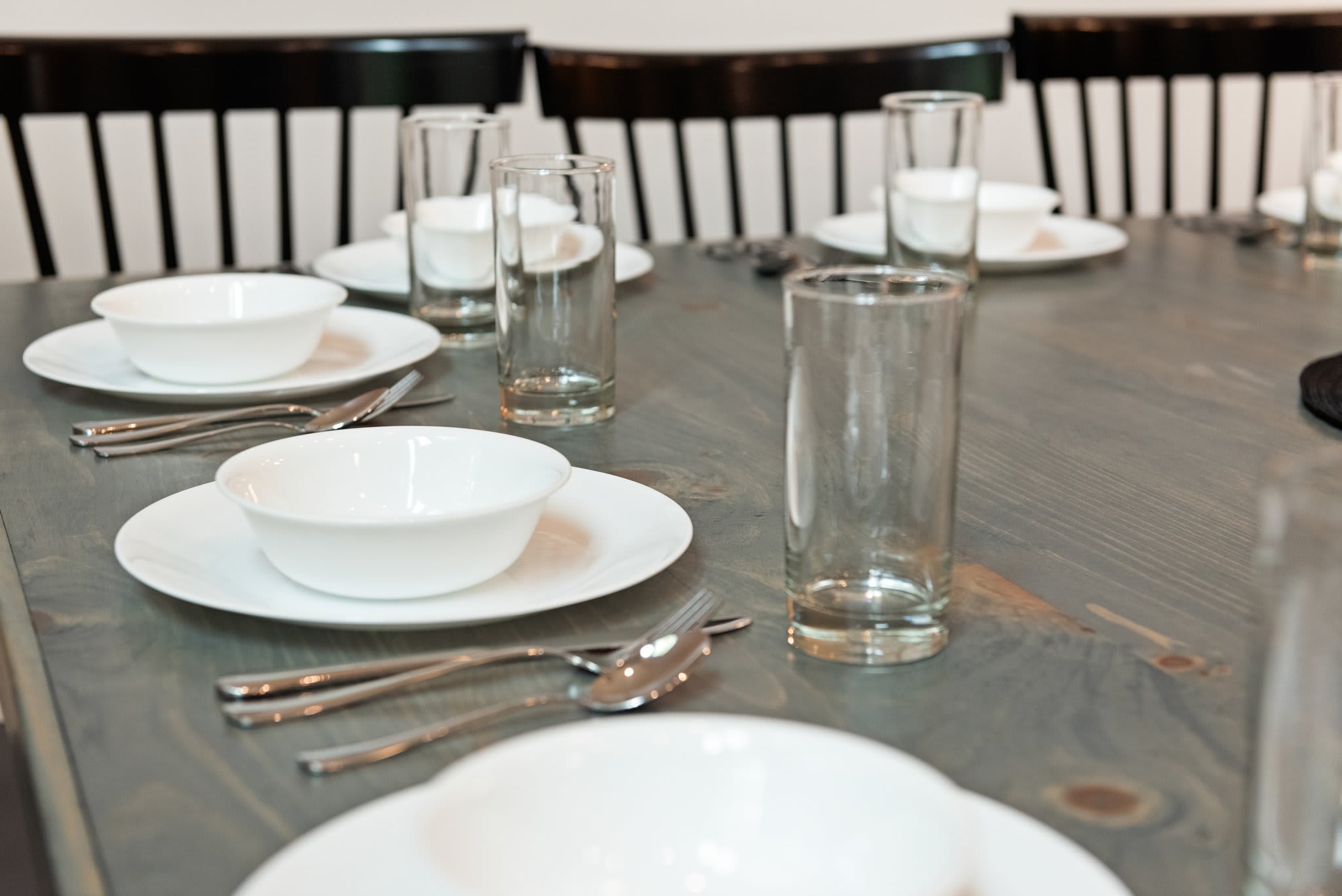 Dining Table Close-Up
A clean, inviting setup that makes every meal feel like an occasion. Simple, well-placed tableware adds to the charm.