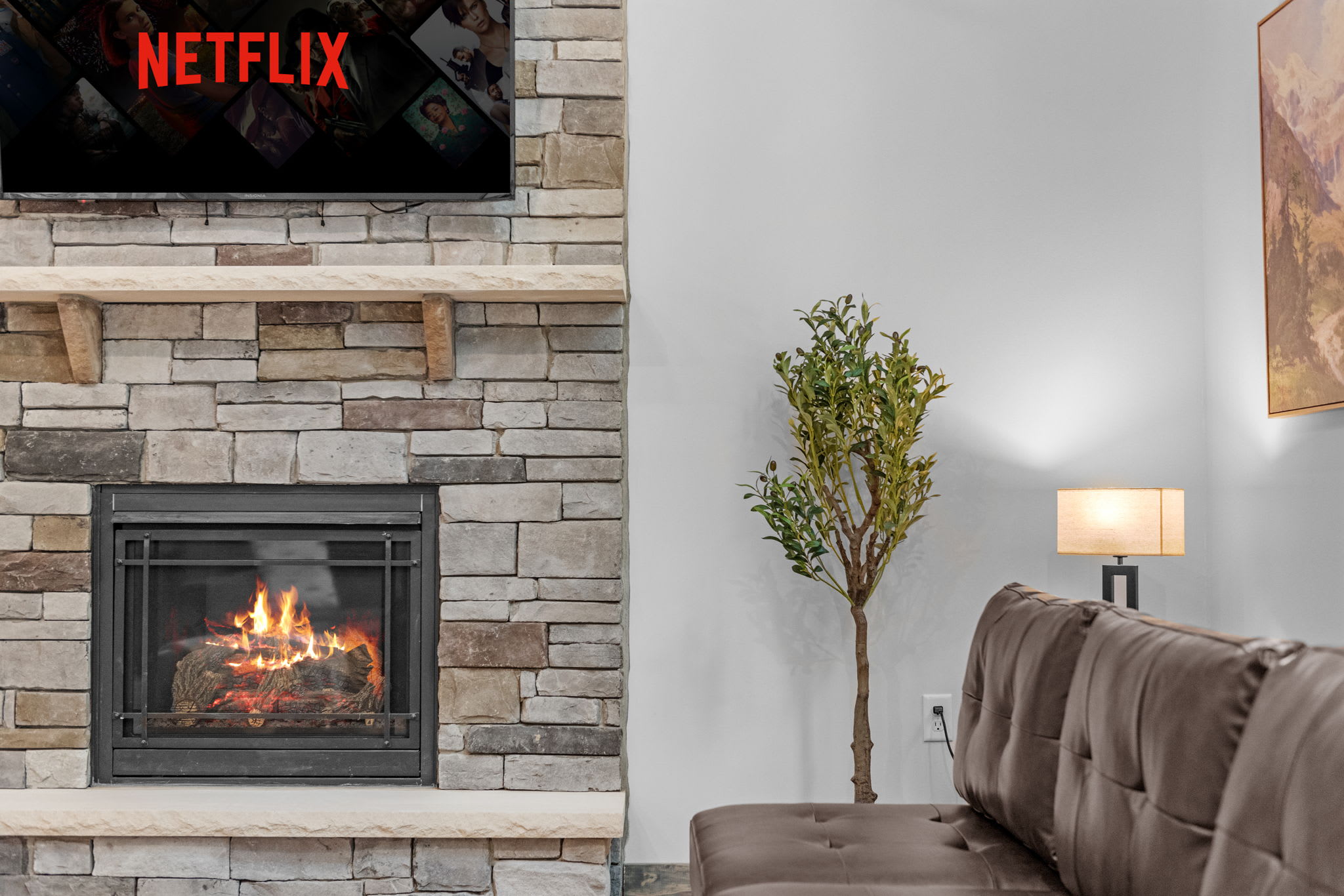 Fireplace Close-Up with Netflix
A beautiful stone fireplace anchors the room, perfect for movie nights or just unwinding after a day of exploring.