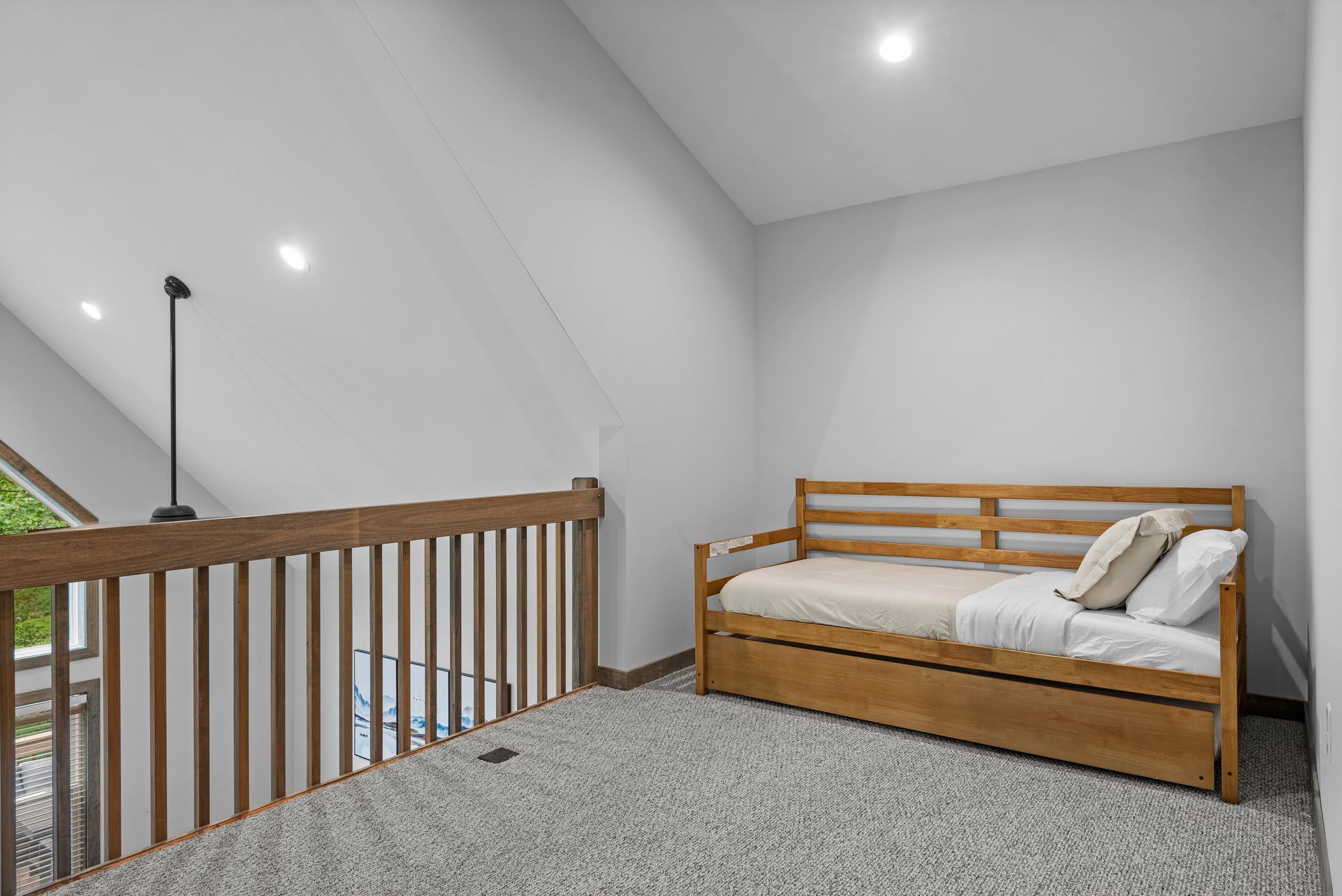 Loft Daybed by Railing
A cozy nook overlooking the main space. Great for reading, lounging, or catching some quiet time while still feeling connected.