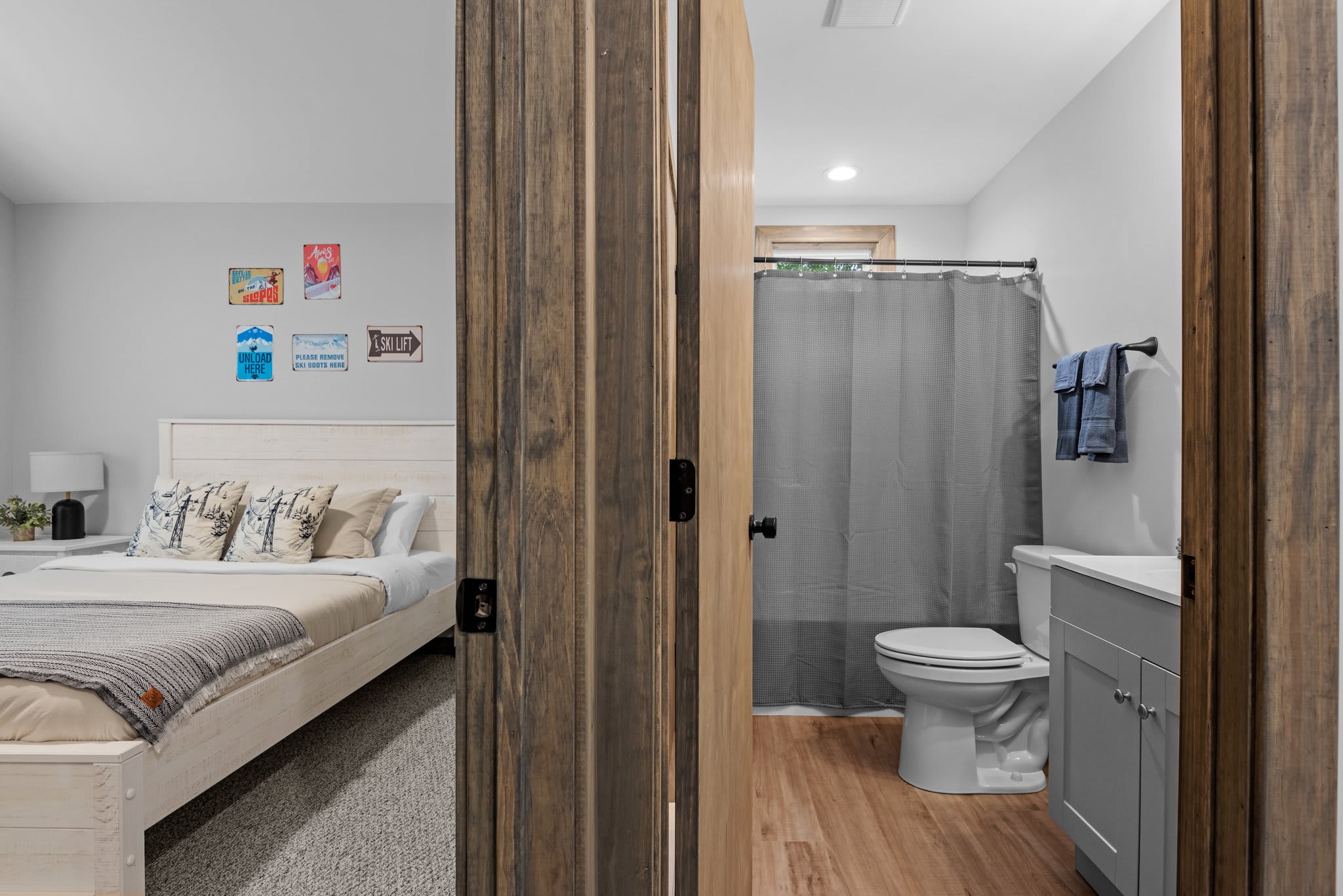 Bathroom with neutral tones and full amenities. Clean, stylish, and convenient for added privacy.