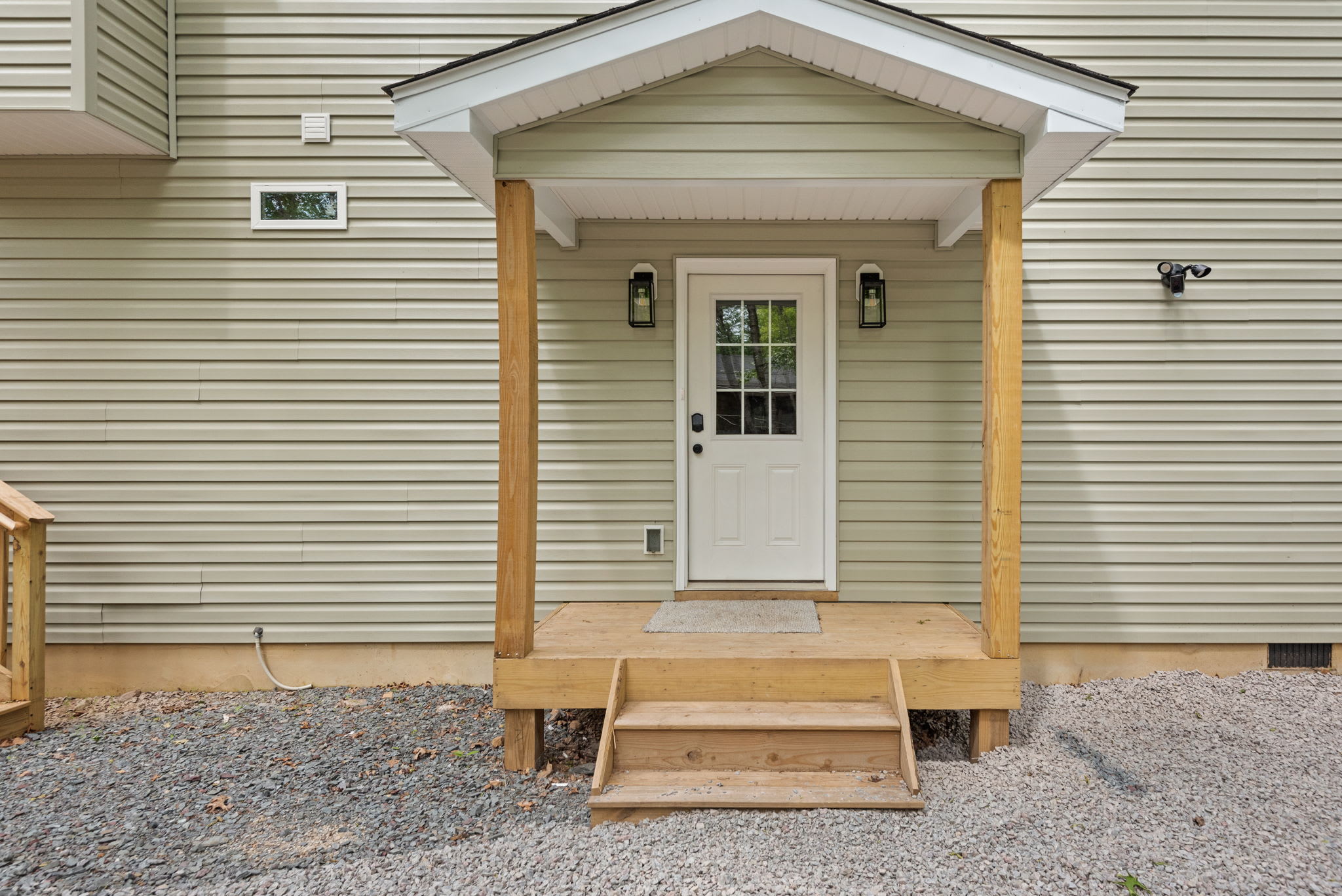 Front Door Entrance
A clean and simple entryway that sets the tone for a warm, welcoming stay from the moment you arrive.