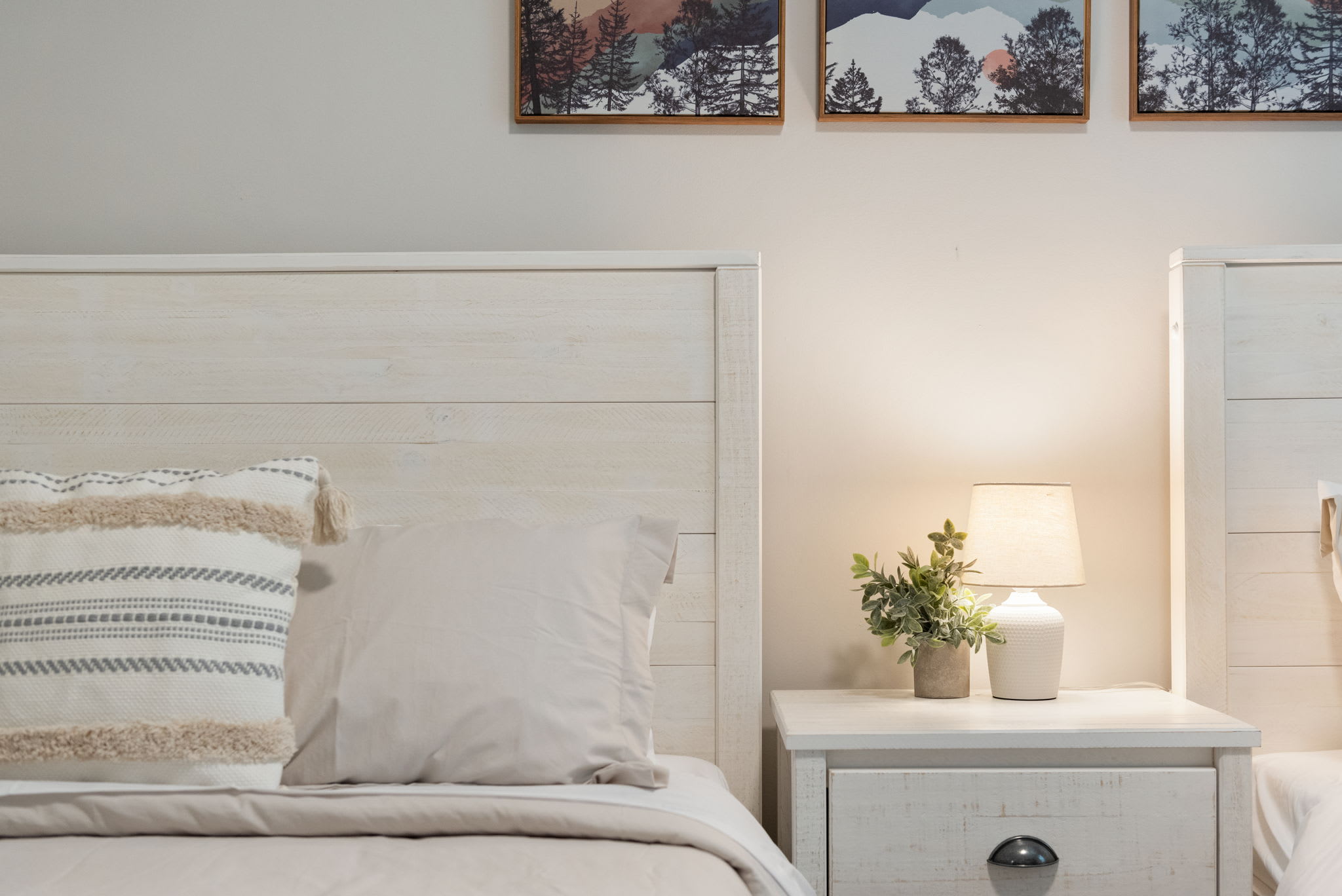 A cozy look at the textures and touches that give this twin room its warm, homey vibe.