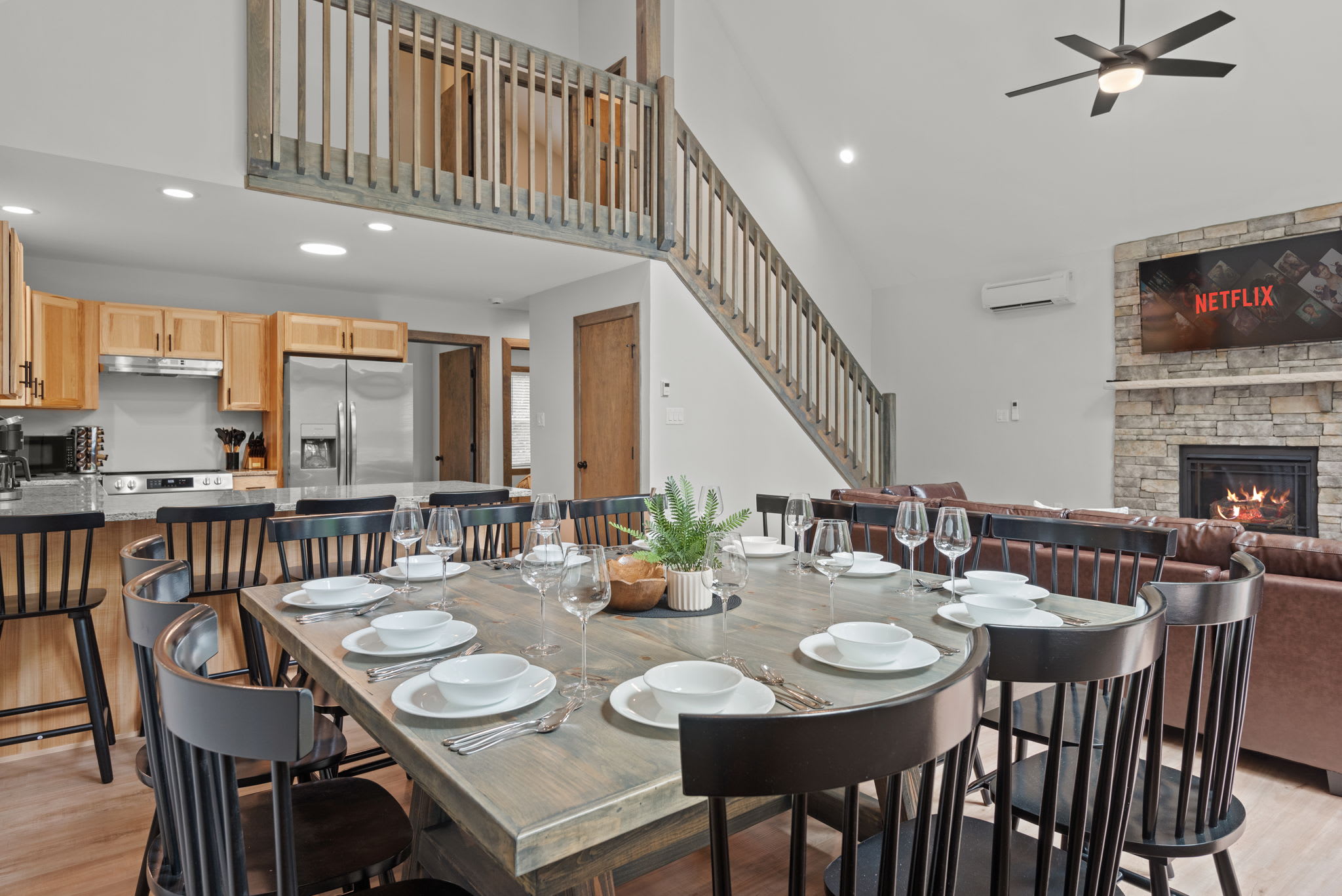 Dining Area with Fireplace View
The heart of the home. A large dining table sits just off the living space, perfect for gathering and sharing good food and conversation.