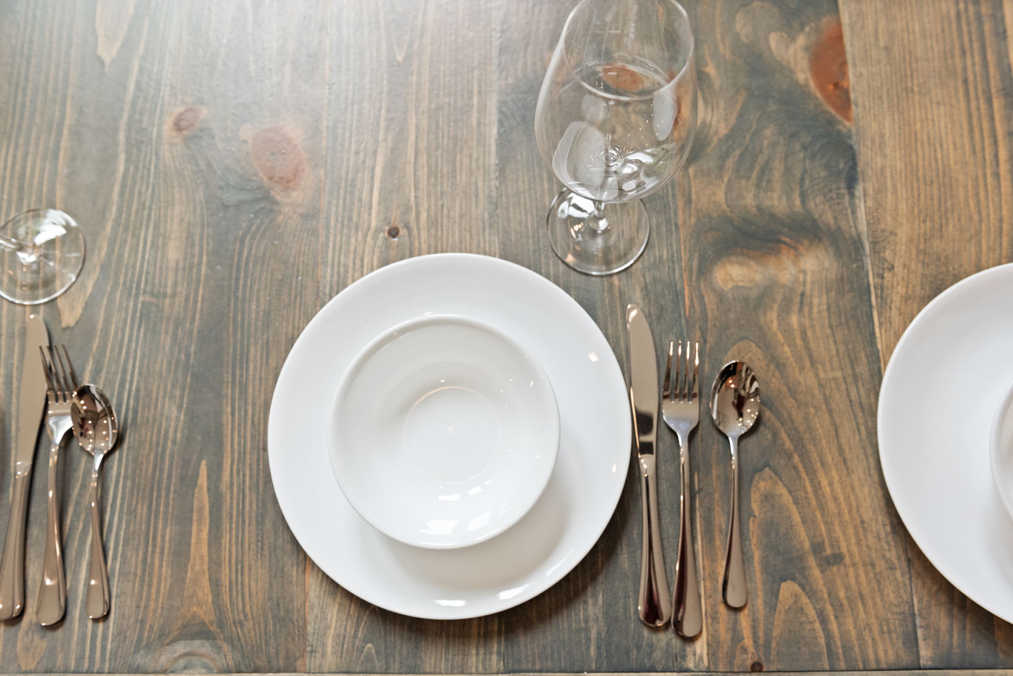Table Setting Detail
A close-up of the elegant place settings. Simple, clean, and ready for anything from casual meals to celebration dinners.