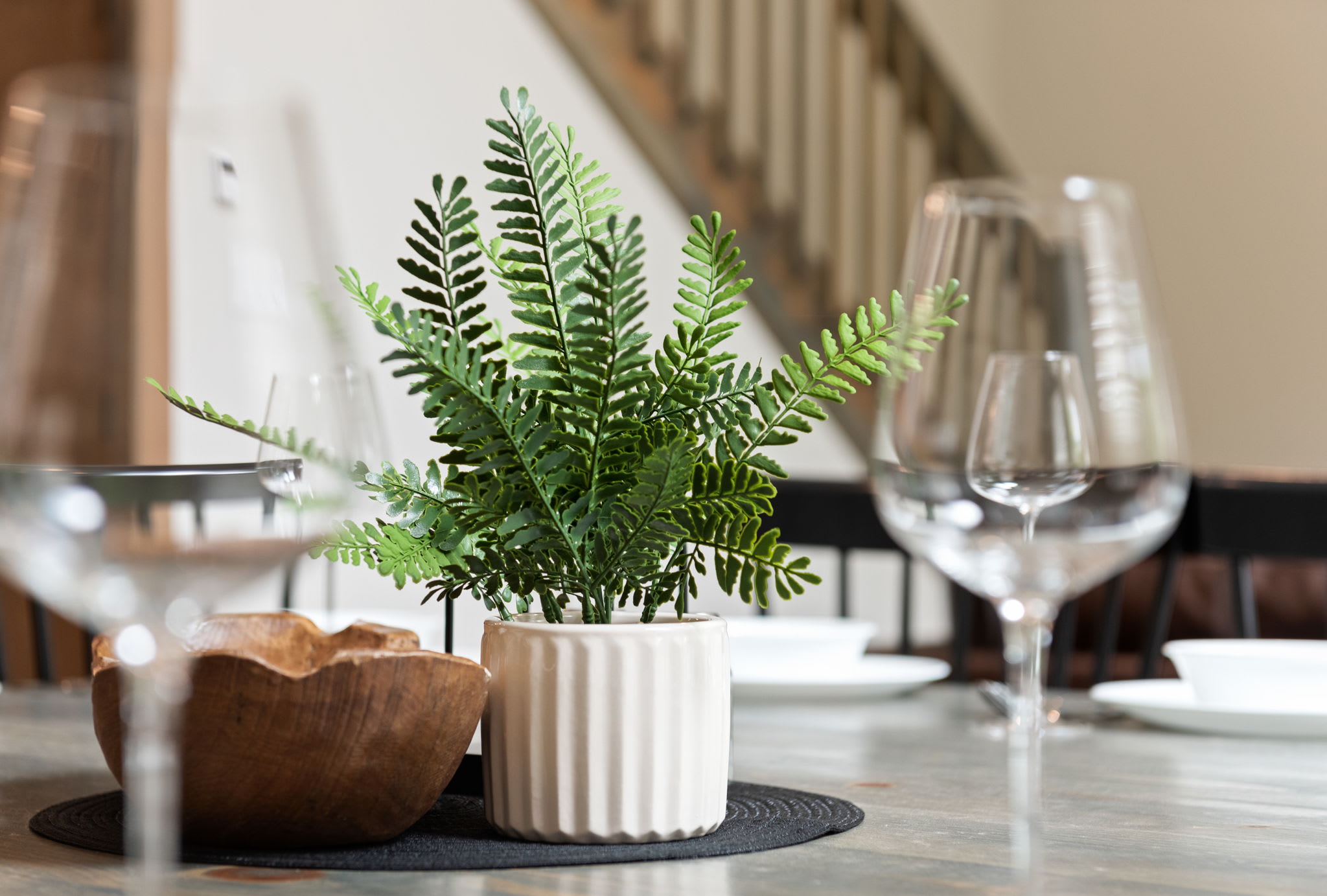 Table Decor Close-Up
Thoughtfully styled with natural elements and glassware that bring a modern yet cozy feel to the table.