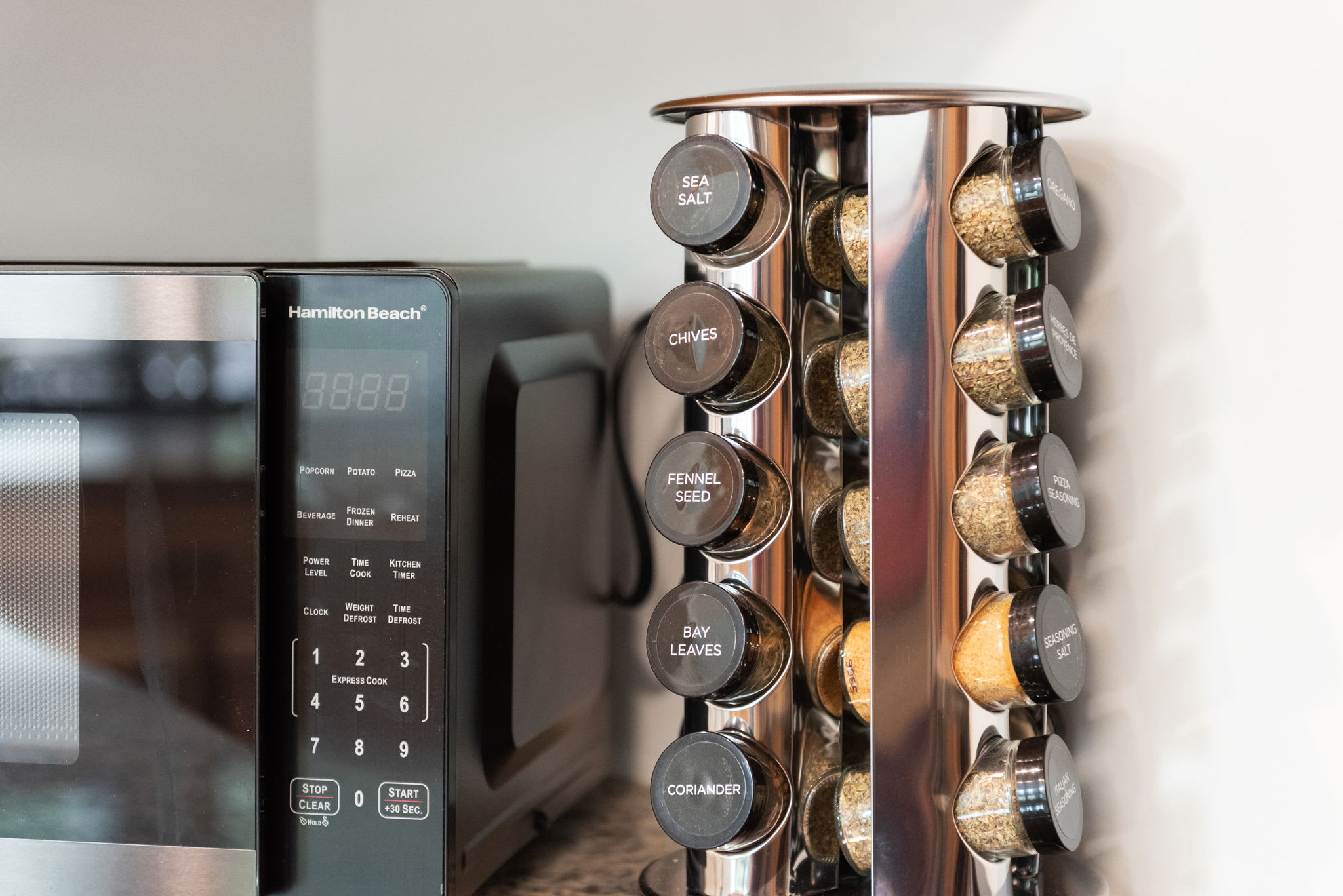 Spice Rack and Microwave Corner
Neatly organized with all the basics at your fingertips, this kitchen corner is perfect for prepping meals or quick snacks.