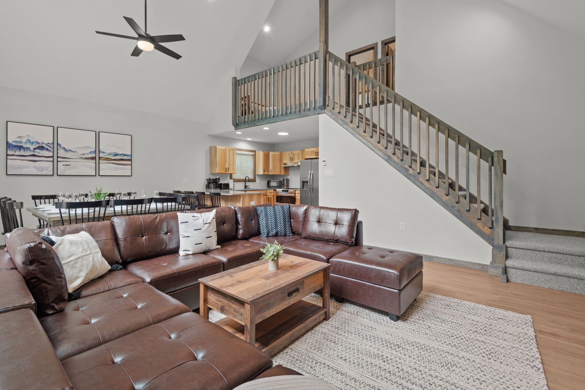 Living Room and Dining Area Angle
A warm and inviting view that highlights the seamless flow between living, dining, and kitchen.