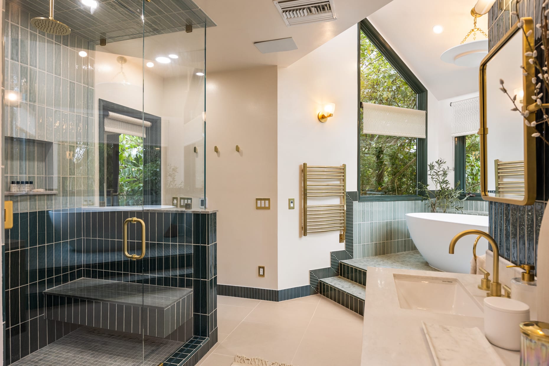 Bright and airy master bathroom with plenty of natural light and chic decor.