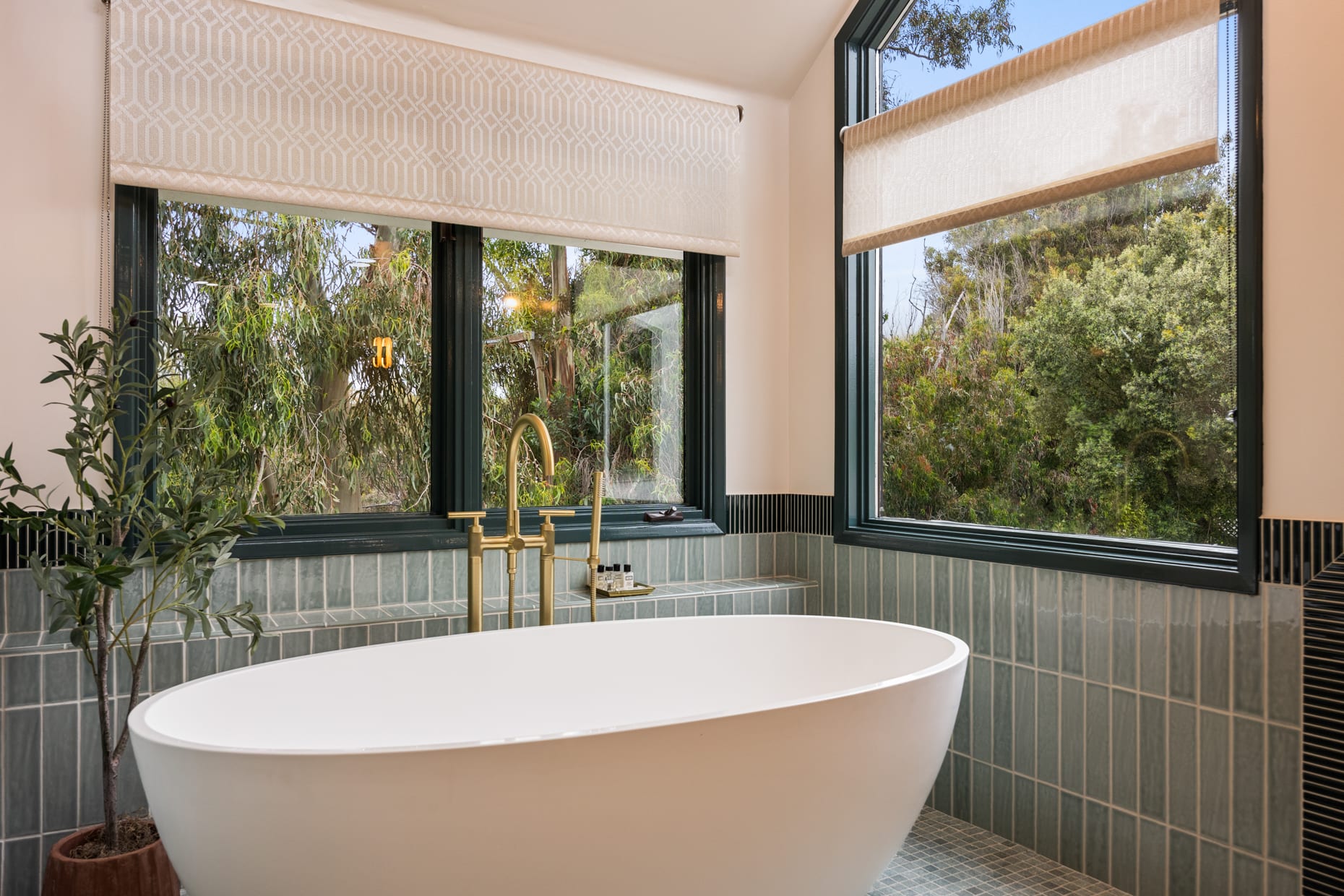 Luxurious master bathroom in the primary suite, featuring brand new, high-end fixtures.