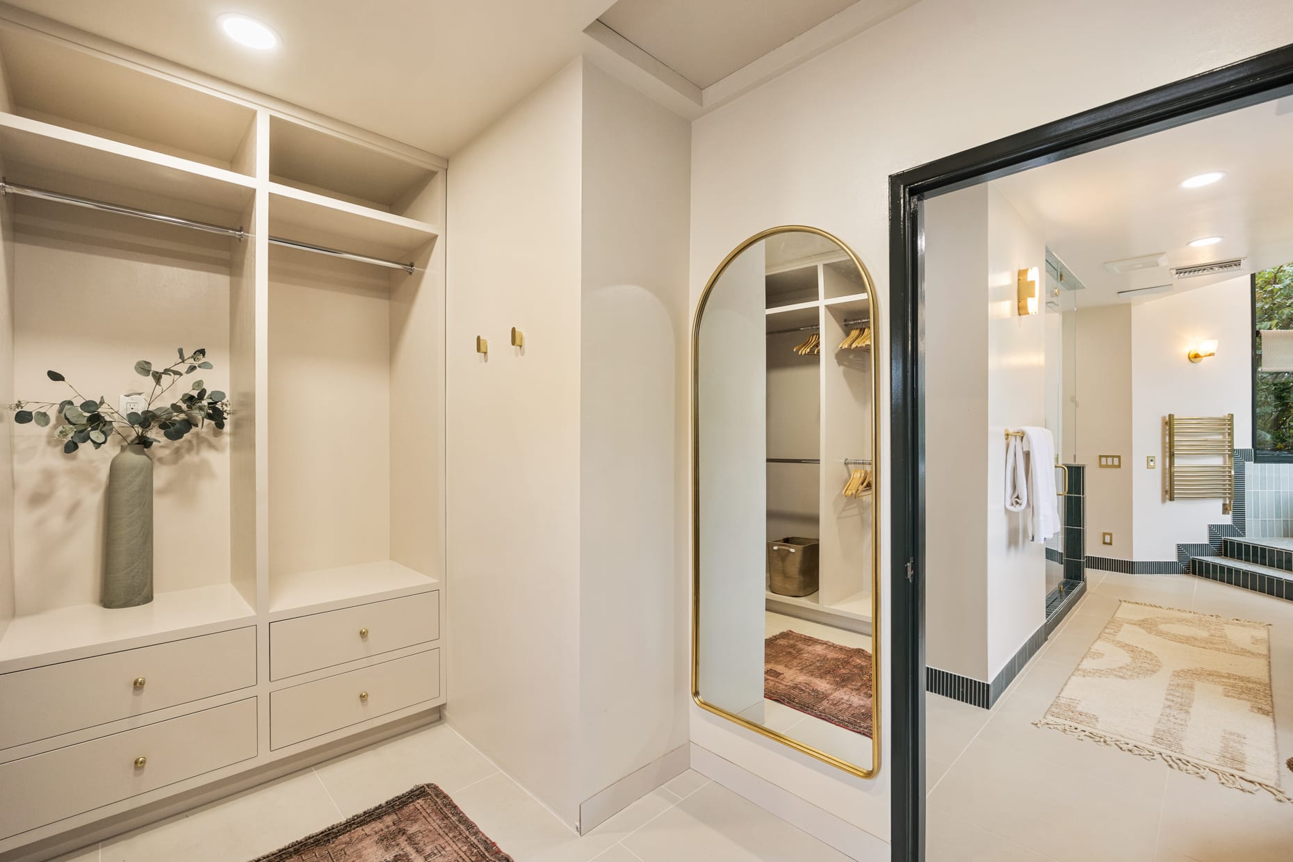 Spacious walk-in closet with custom shelving and ample storage space for all your belongings.