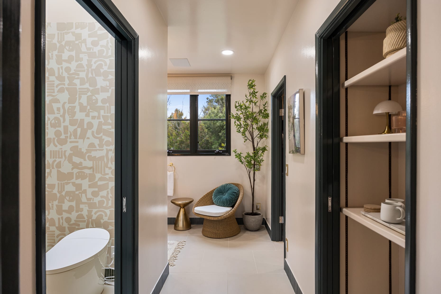 Spacious master bathroom with a secluded toilet area for enhanced privacy and convenience.