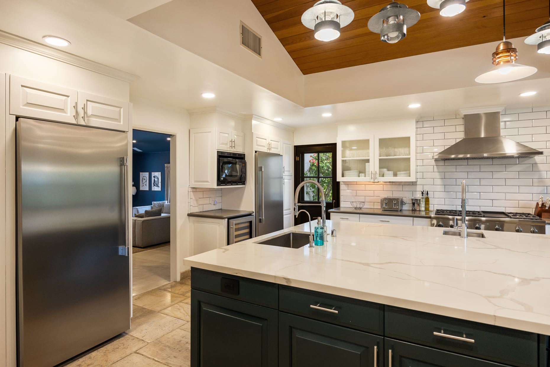 Large fridge and freezer combo with optional grocery delivery and pre-stocking services available.