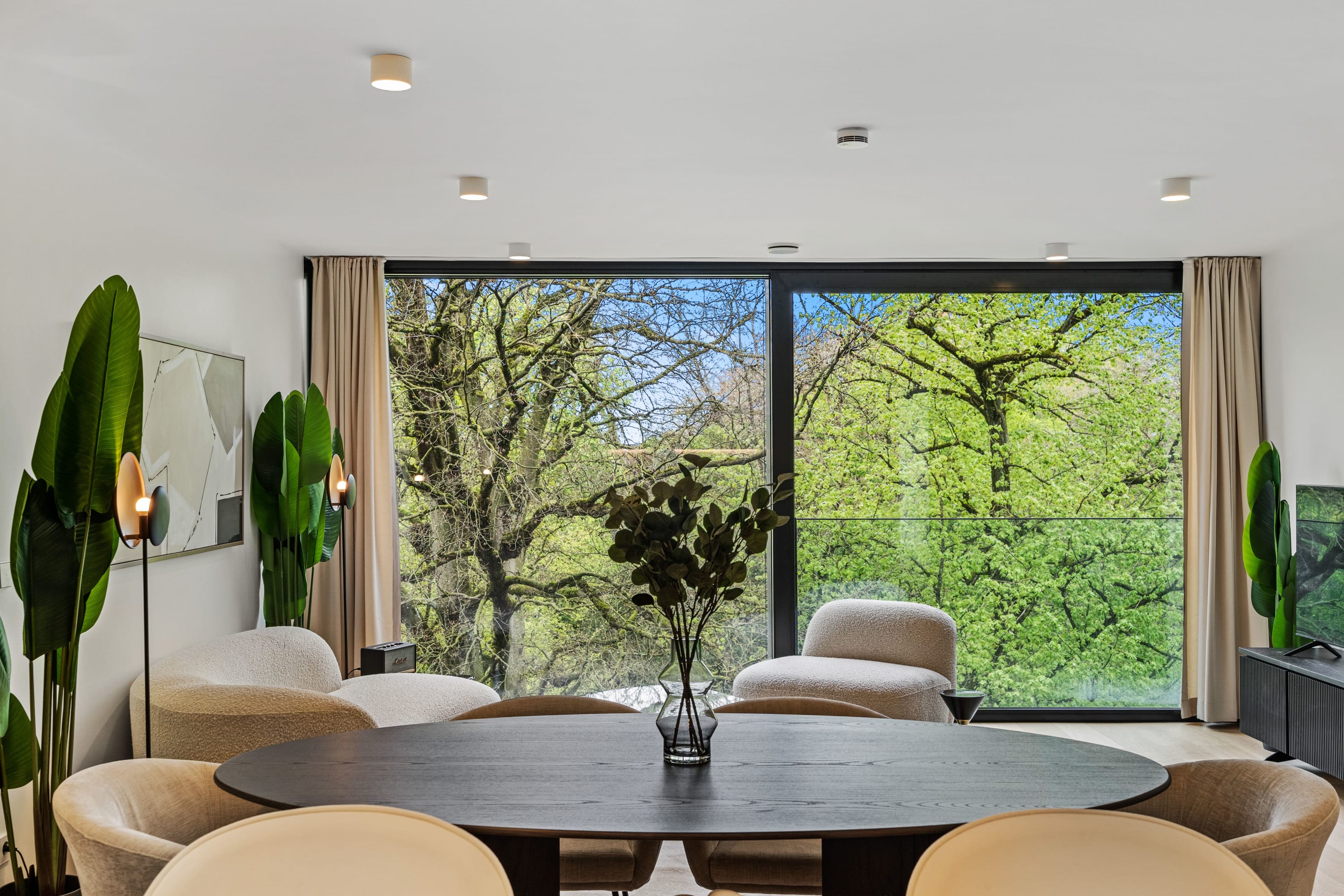 Enjoy breathtaking views of nature from the comfort of our chic living room.
