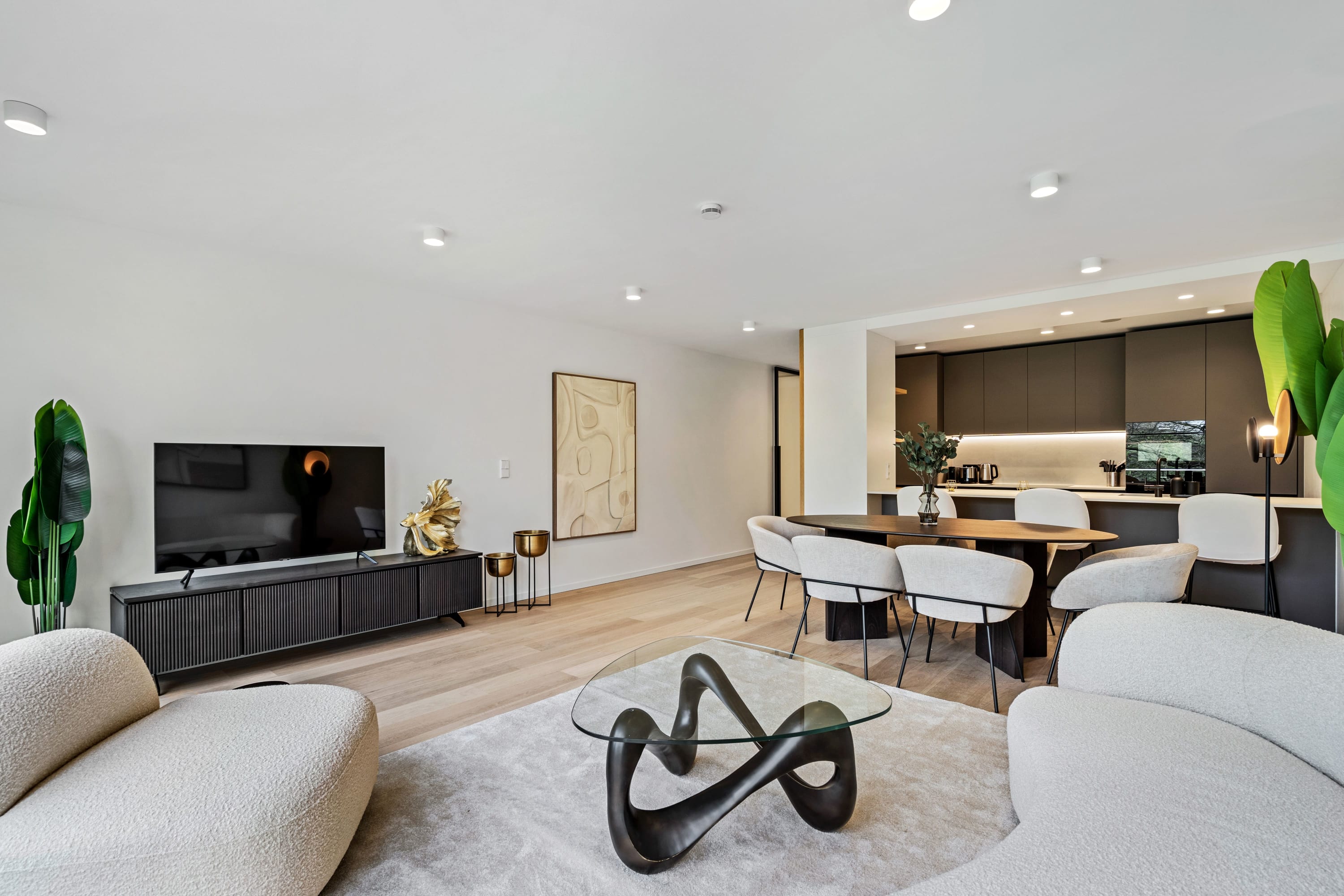 Chic minimalism shines in this well-appointed living space, welcoming you to unwind.