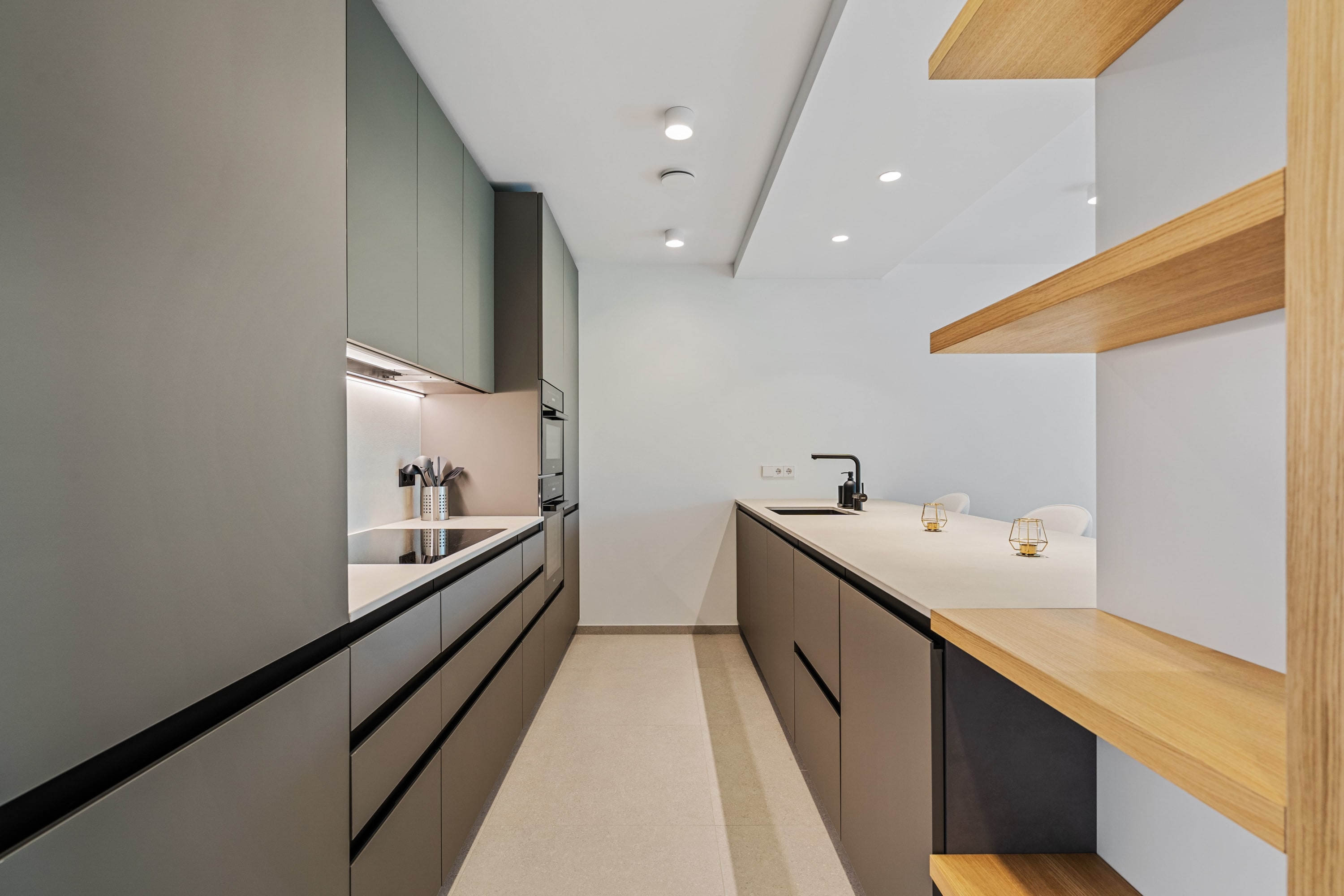 Sleek lines and warm tones: a kitchen that's as inviting as it is modern.