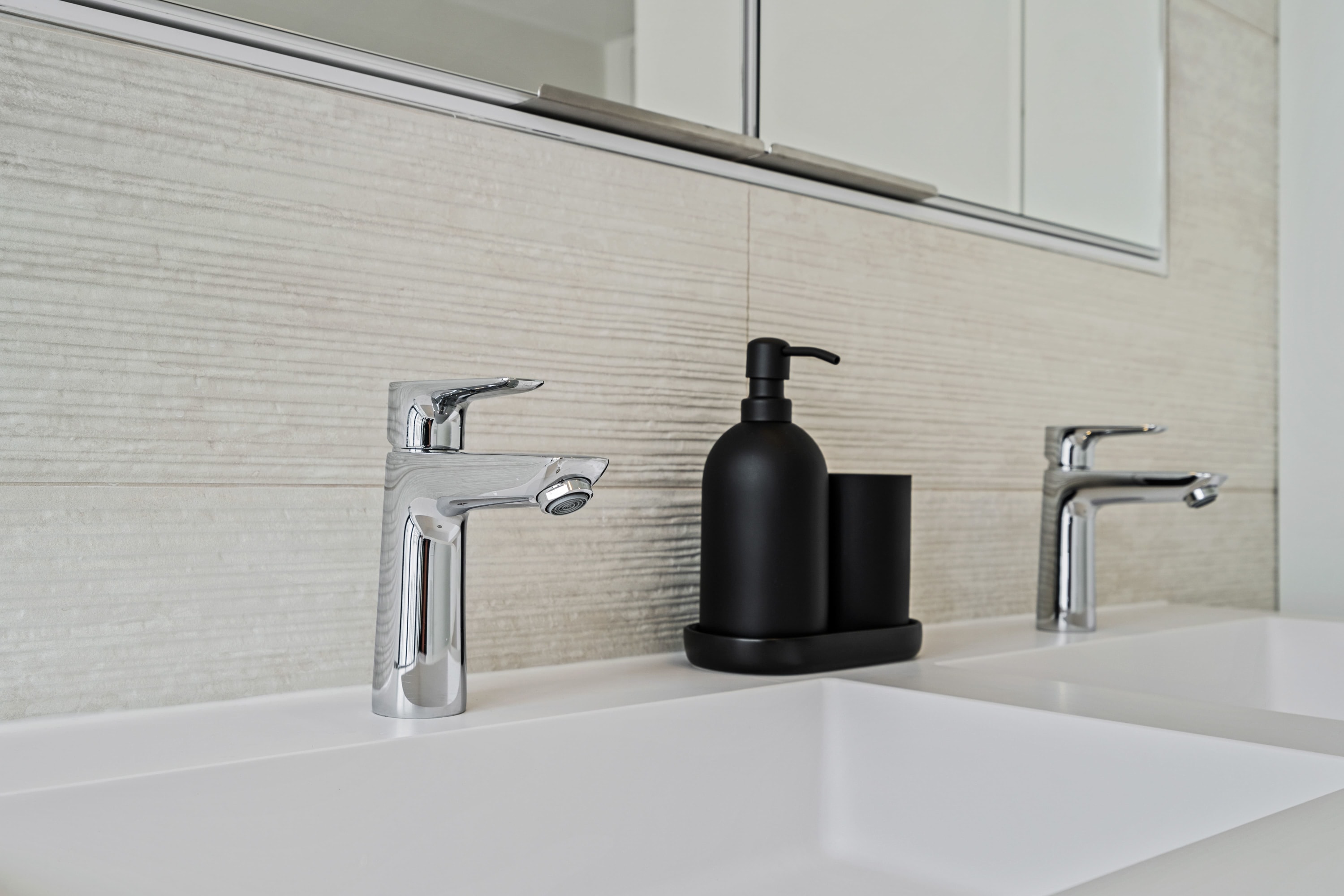 Sleek fixtures and minimalist design for a refreshing bathroom experience.