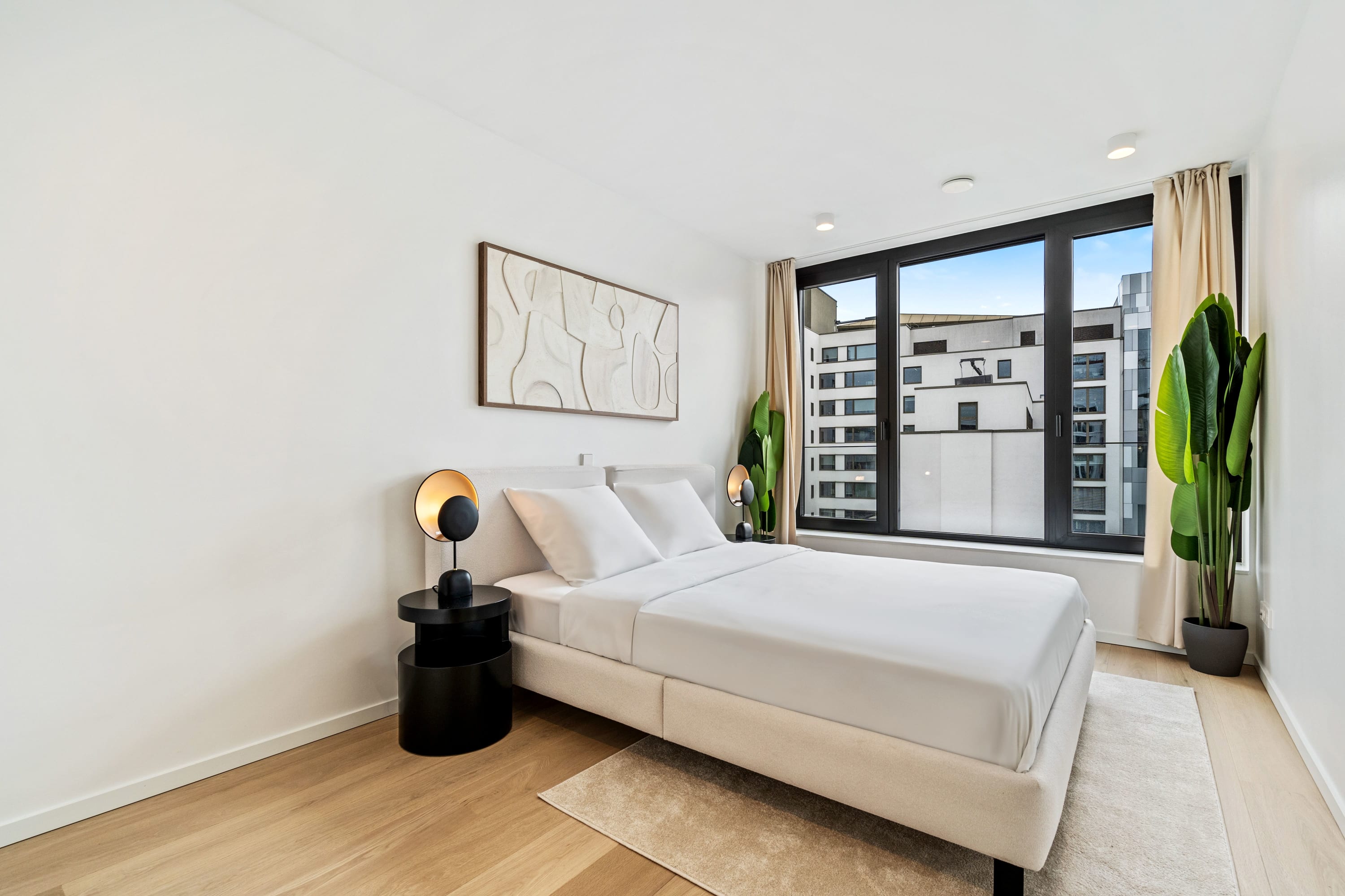 Luxuriate in a tranquil bedroom retreat that connects you with the heart of the city.