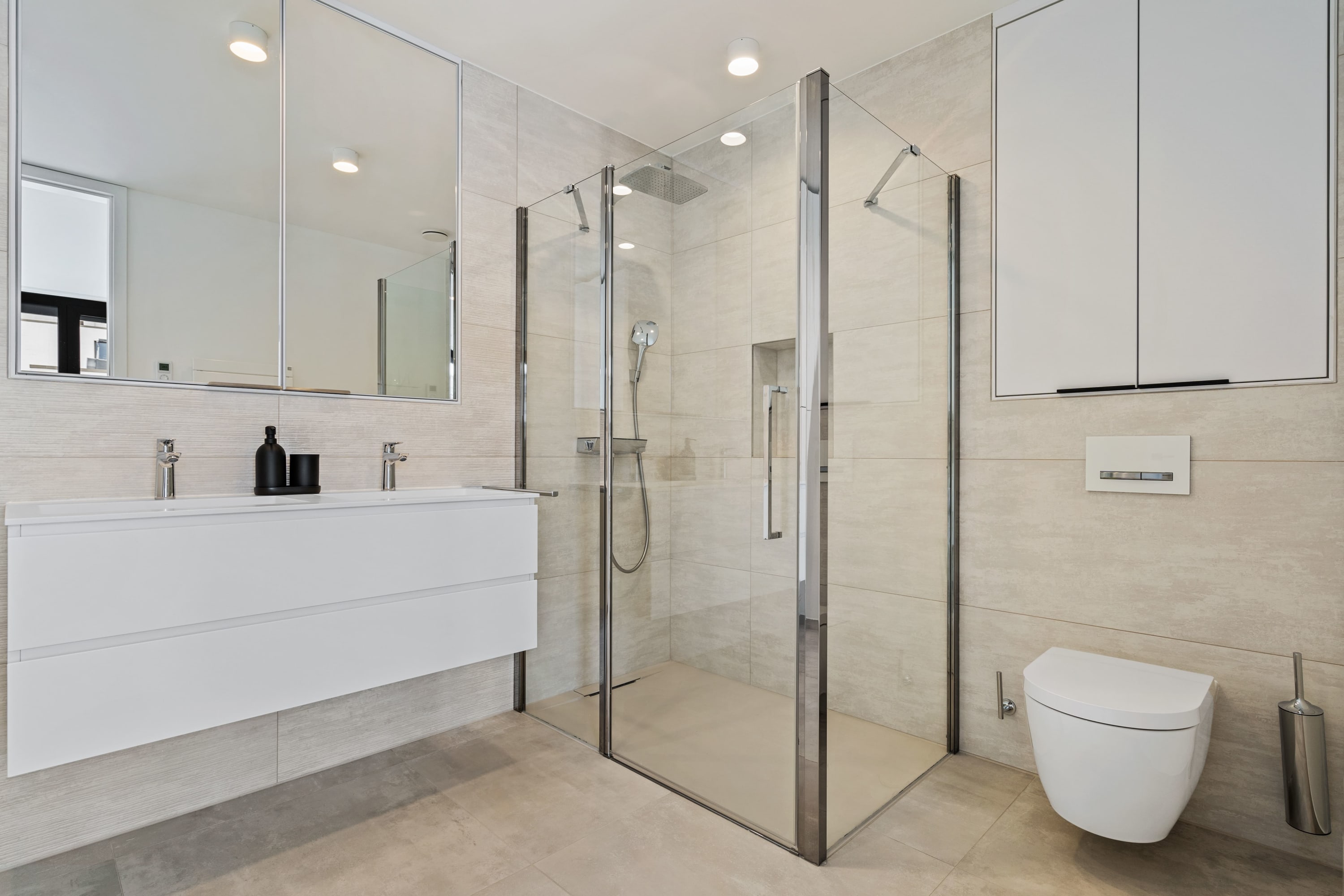 Streamlined for serenity: our bathroom is a modern oasis of calm.