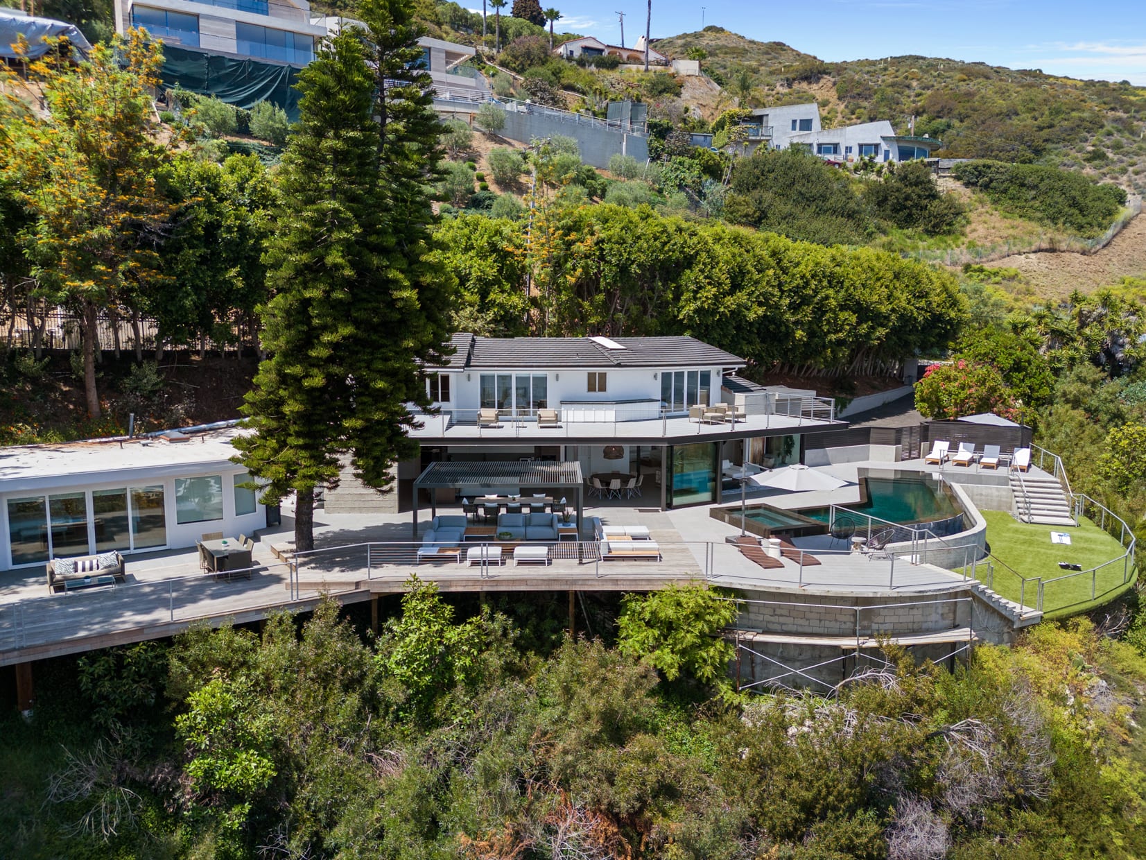 A serene escape with spacious patios, comfortable seating, and stunning ocean views.