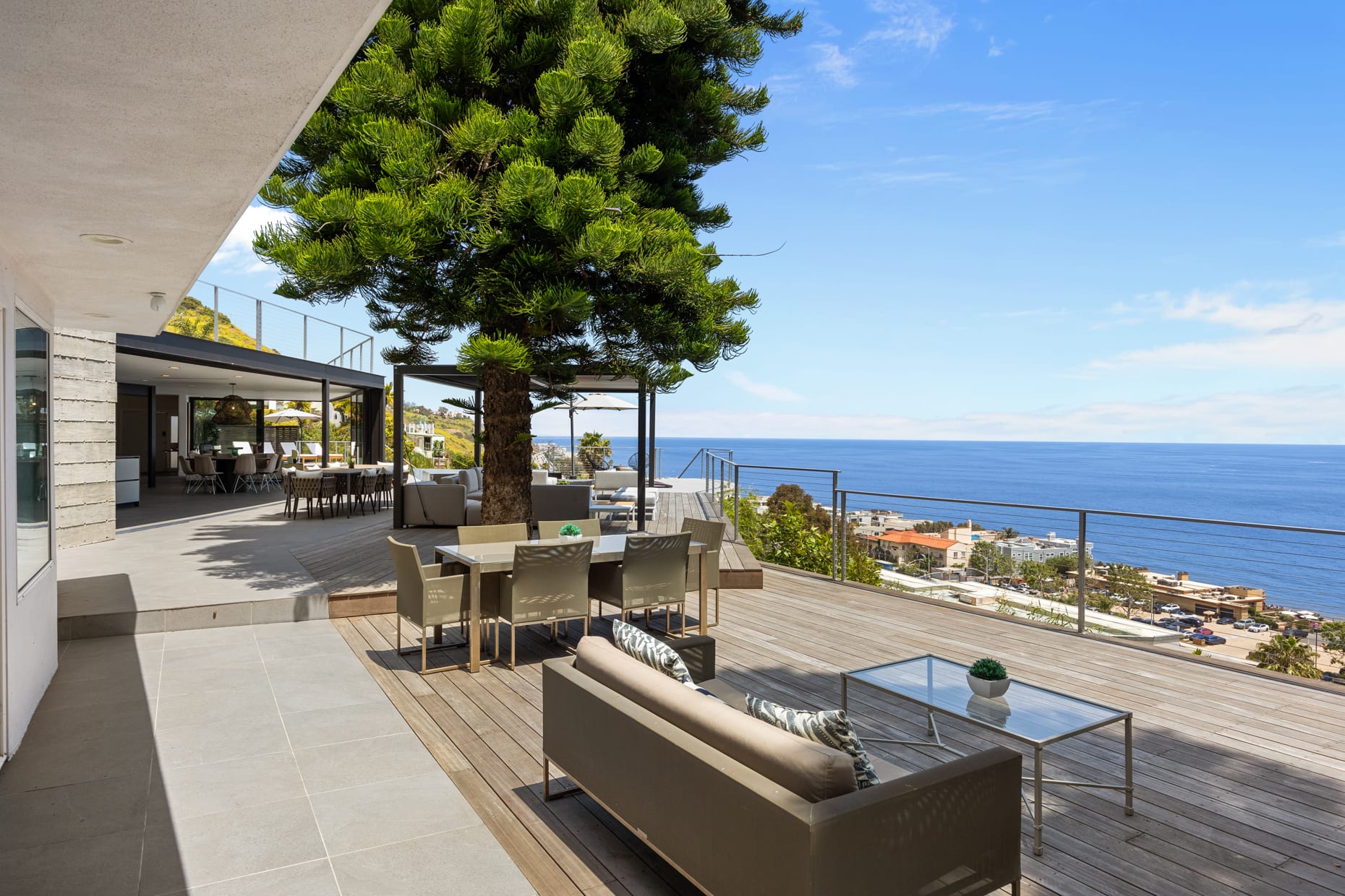 Enjoy additional private dining and outdoor lounge space directly accessible from the bedroom.