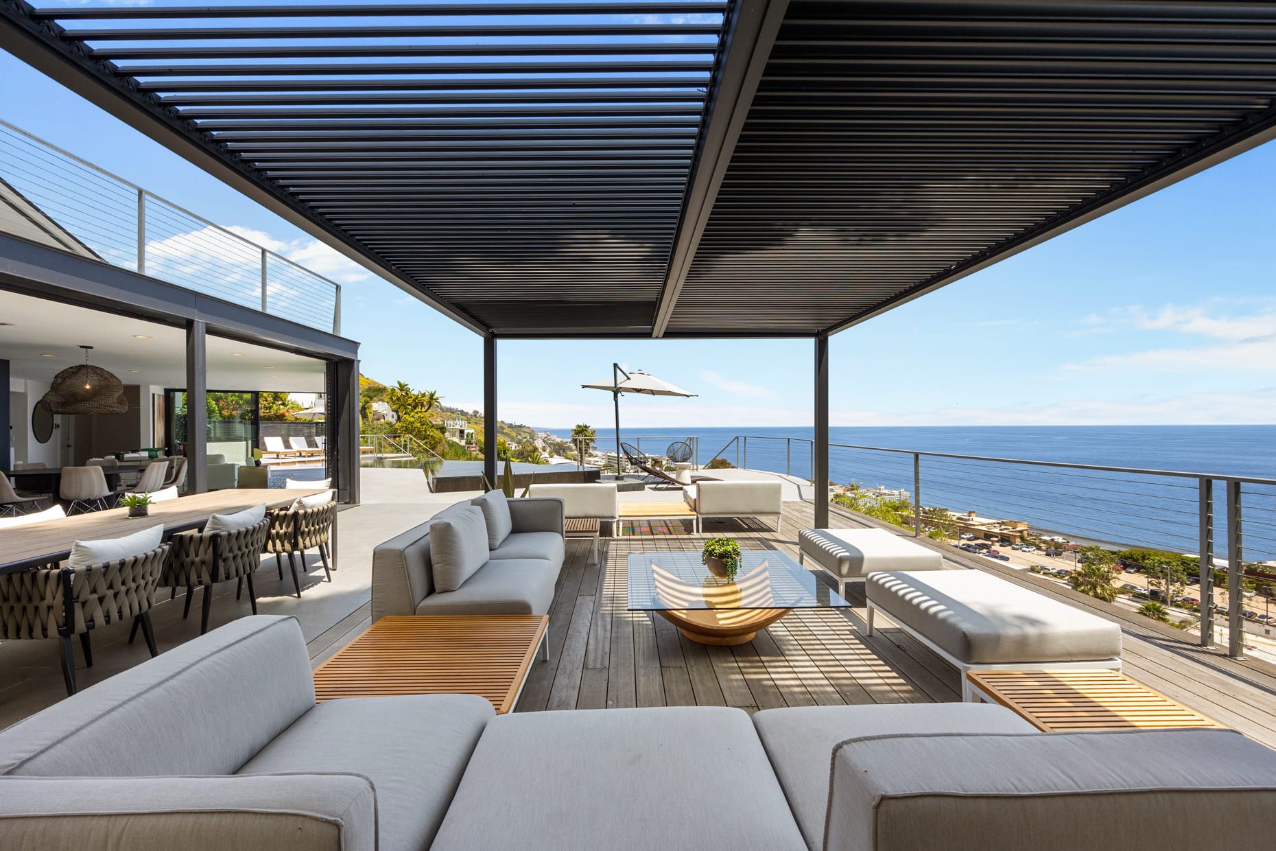 Lounge in the shade and unwind amidst the serene ambiance, surrounded by coastal breezes.