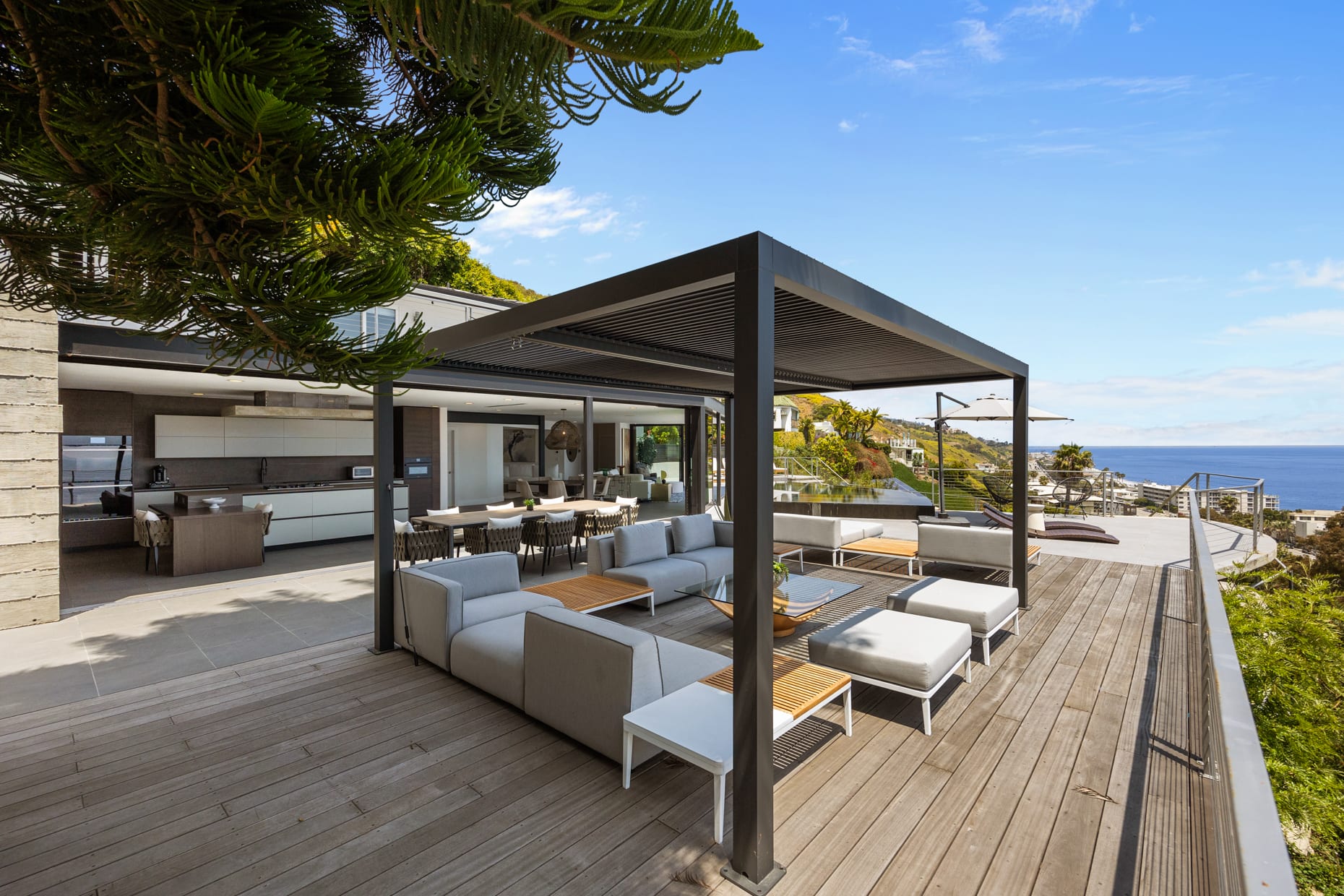 Whether for morning coffee or evening cocktails, the loggia offers a perfect retreat.