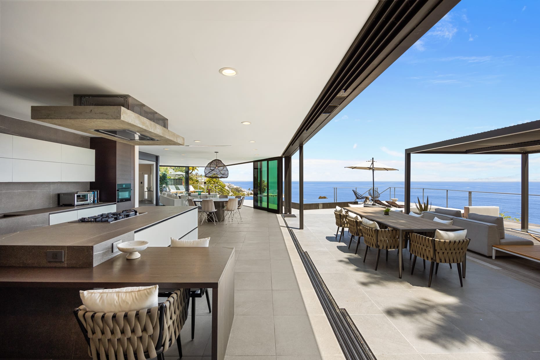 Enjoy meals in multiple dining areas, both indoor and outdoor, each offering breathtaking ocean views.