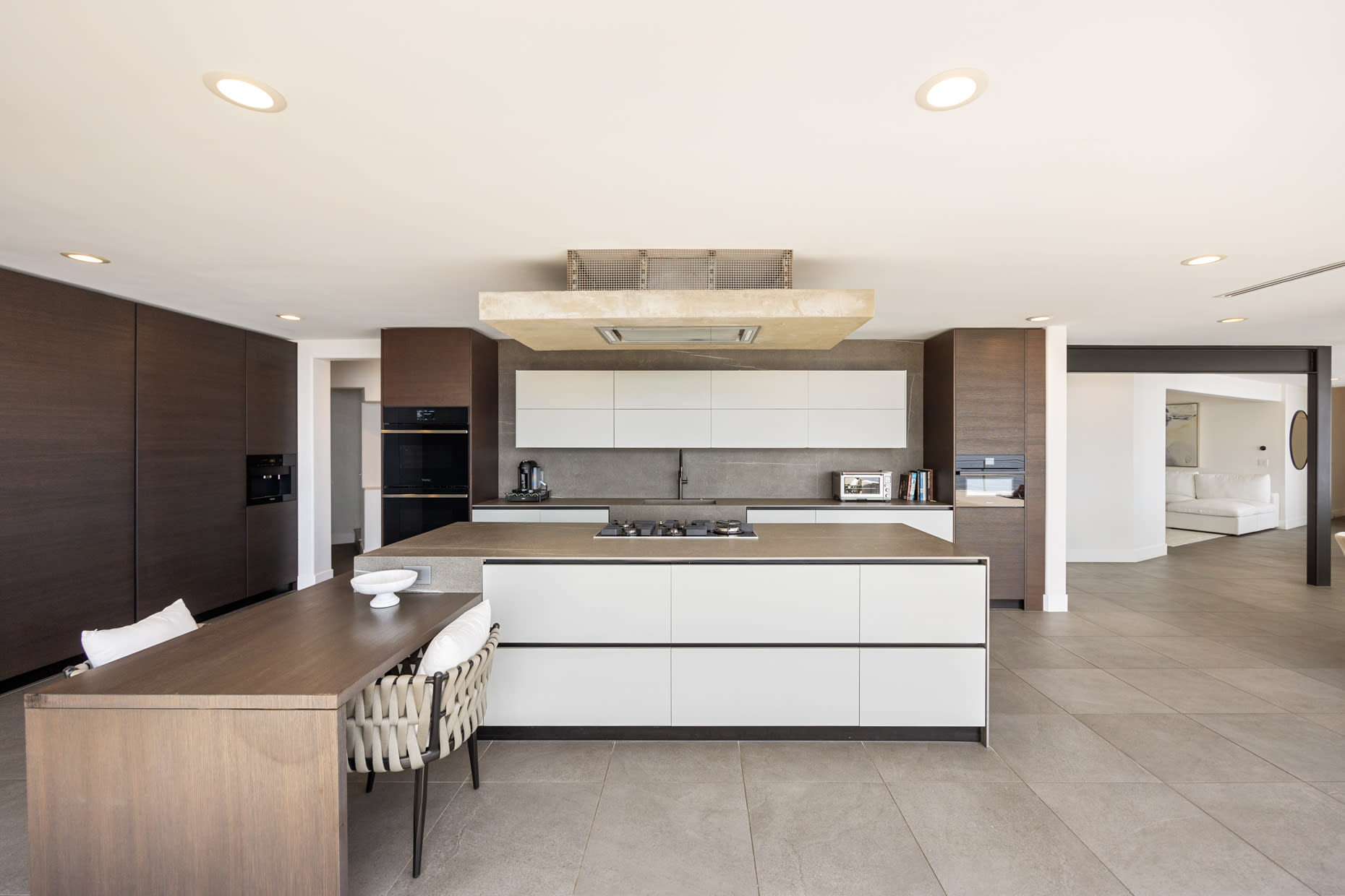 High-quality appliances, including a premium stove, oven, refrigerator, and dishwasher, cater to every culinary need.