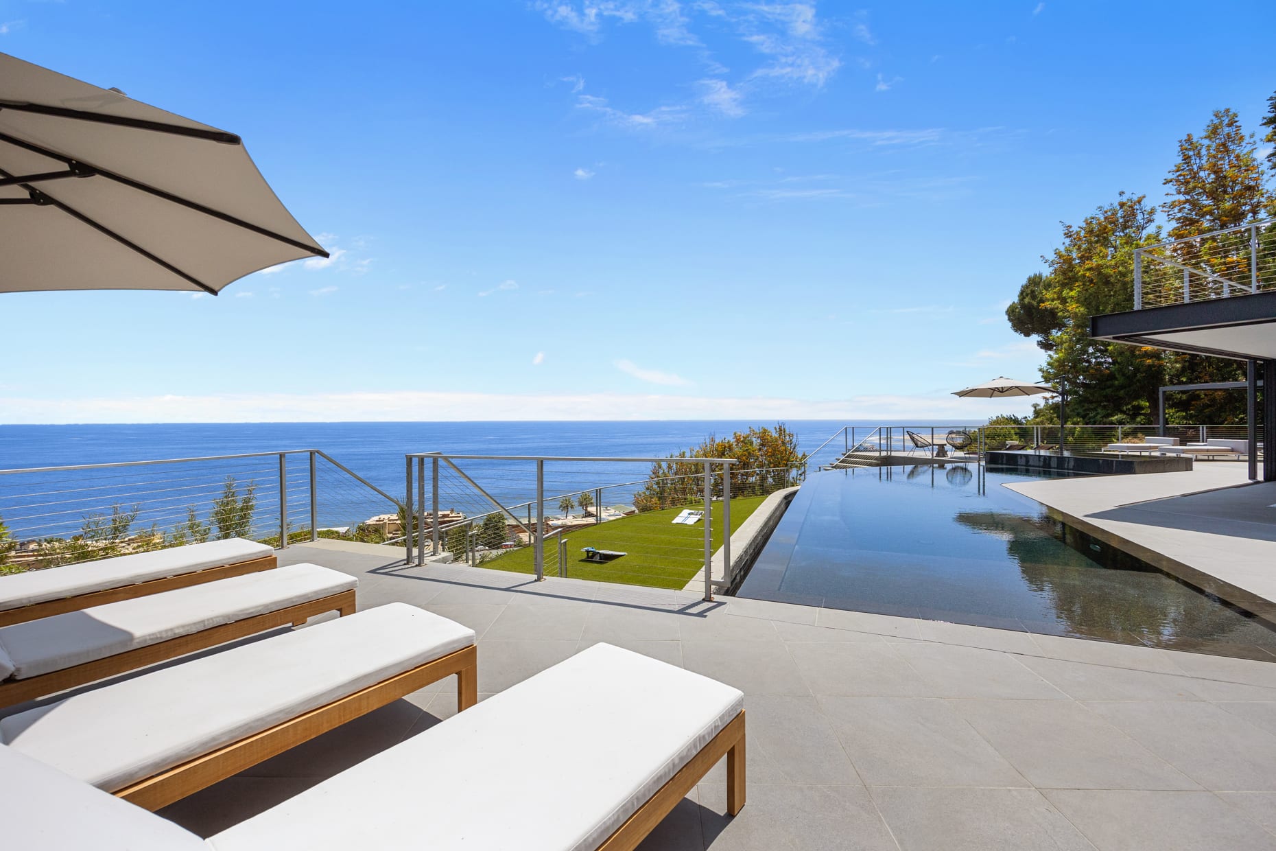 Experience the epitome of outdoor comfort with soft cushions and stylish decor.