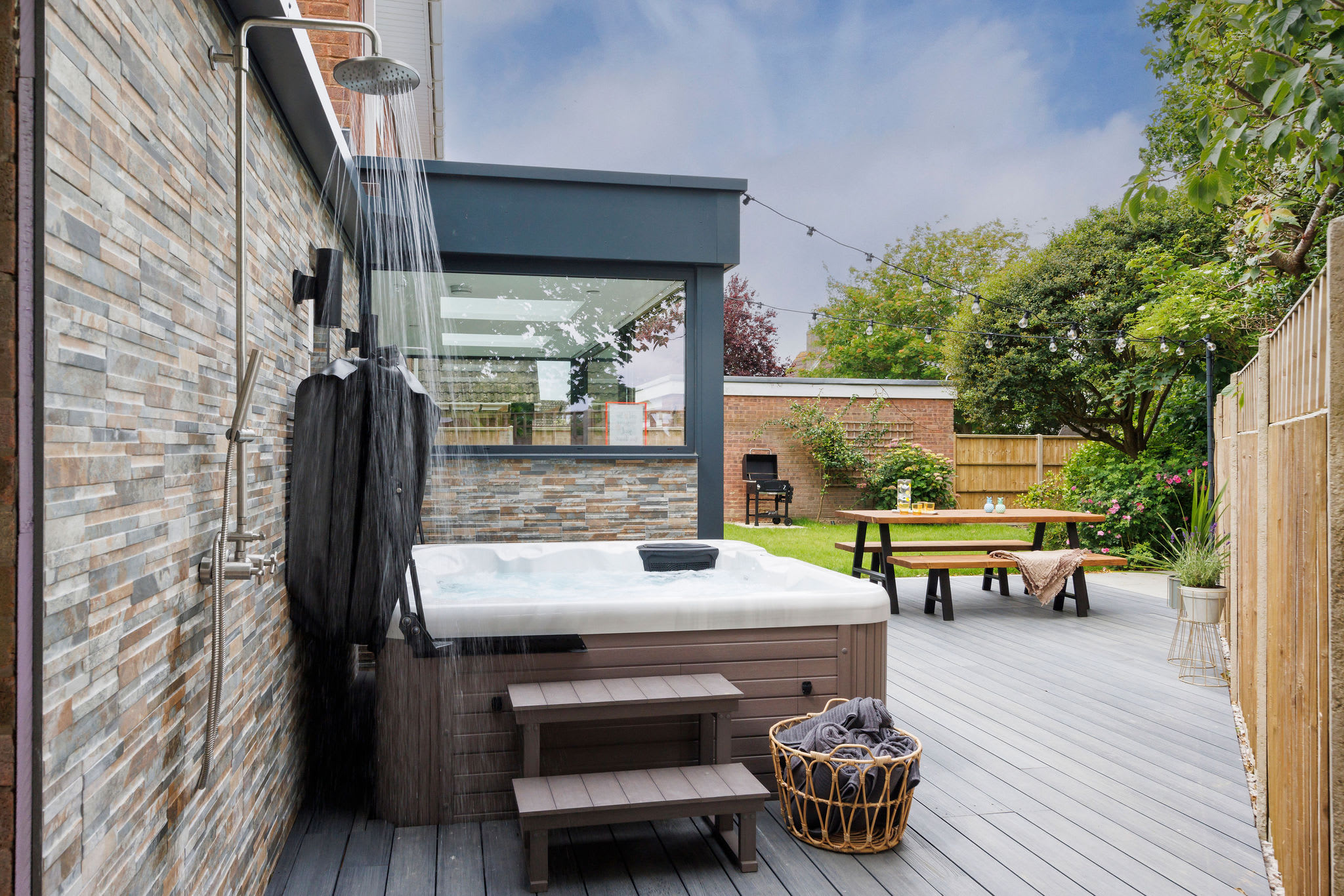 Relax in the hot tub with an outdoor shower