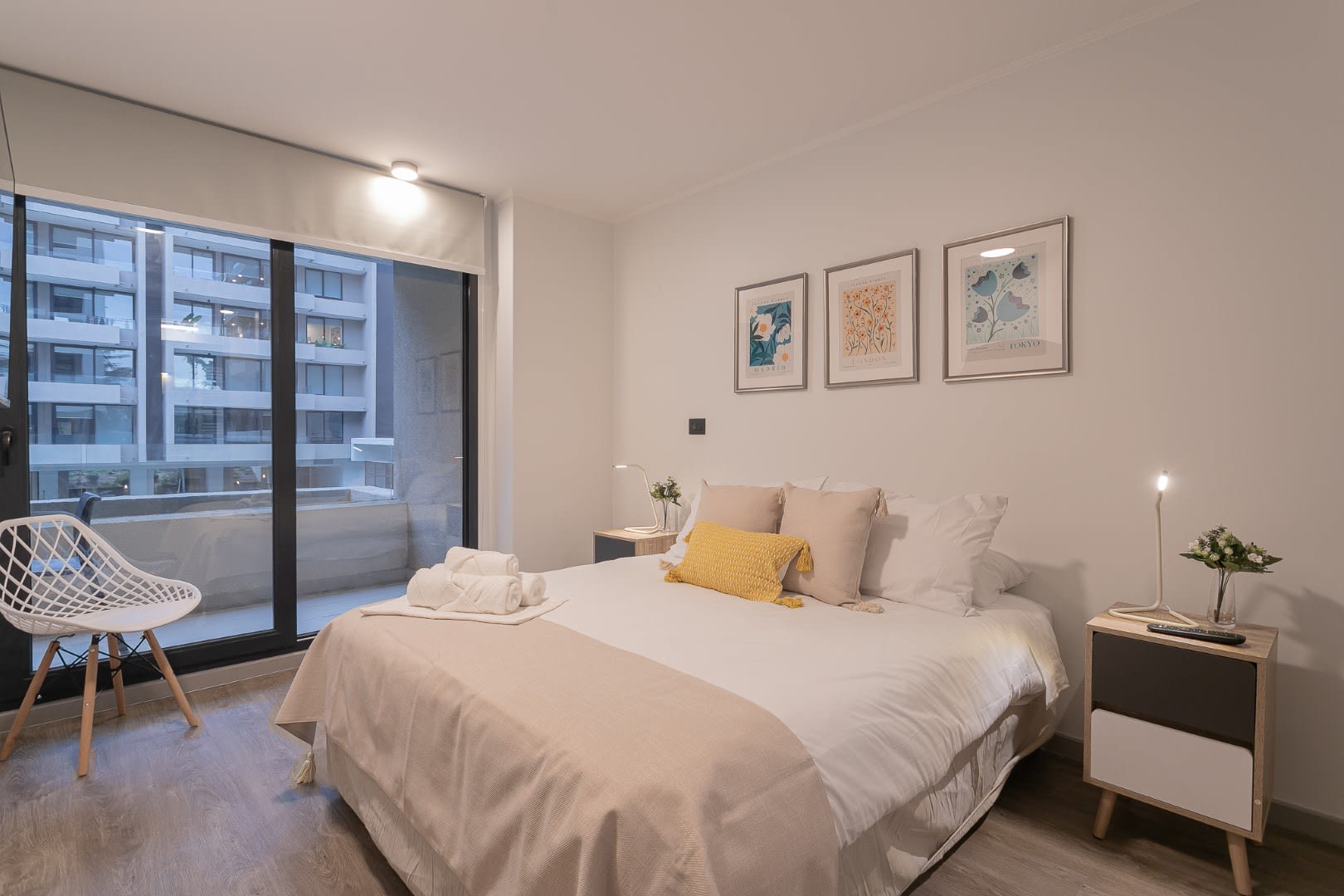 Relax in this stylish bedroom with a private balcony, perfect for unwinding after a day of exploration.