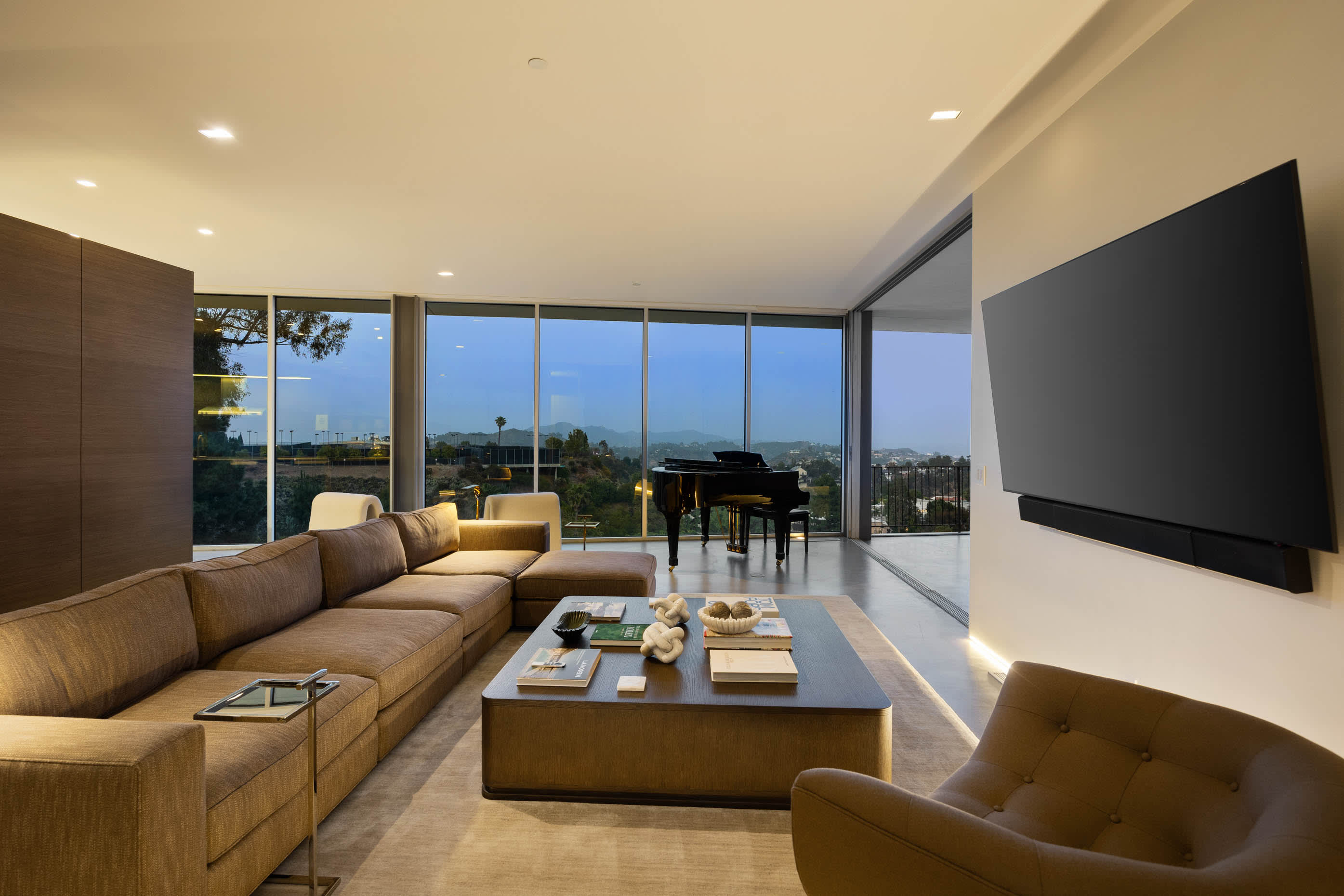 Elegant living space with stunning city views and refined decor.