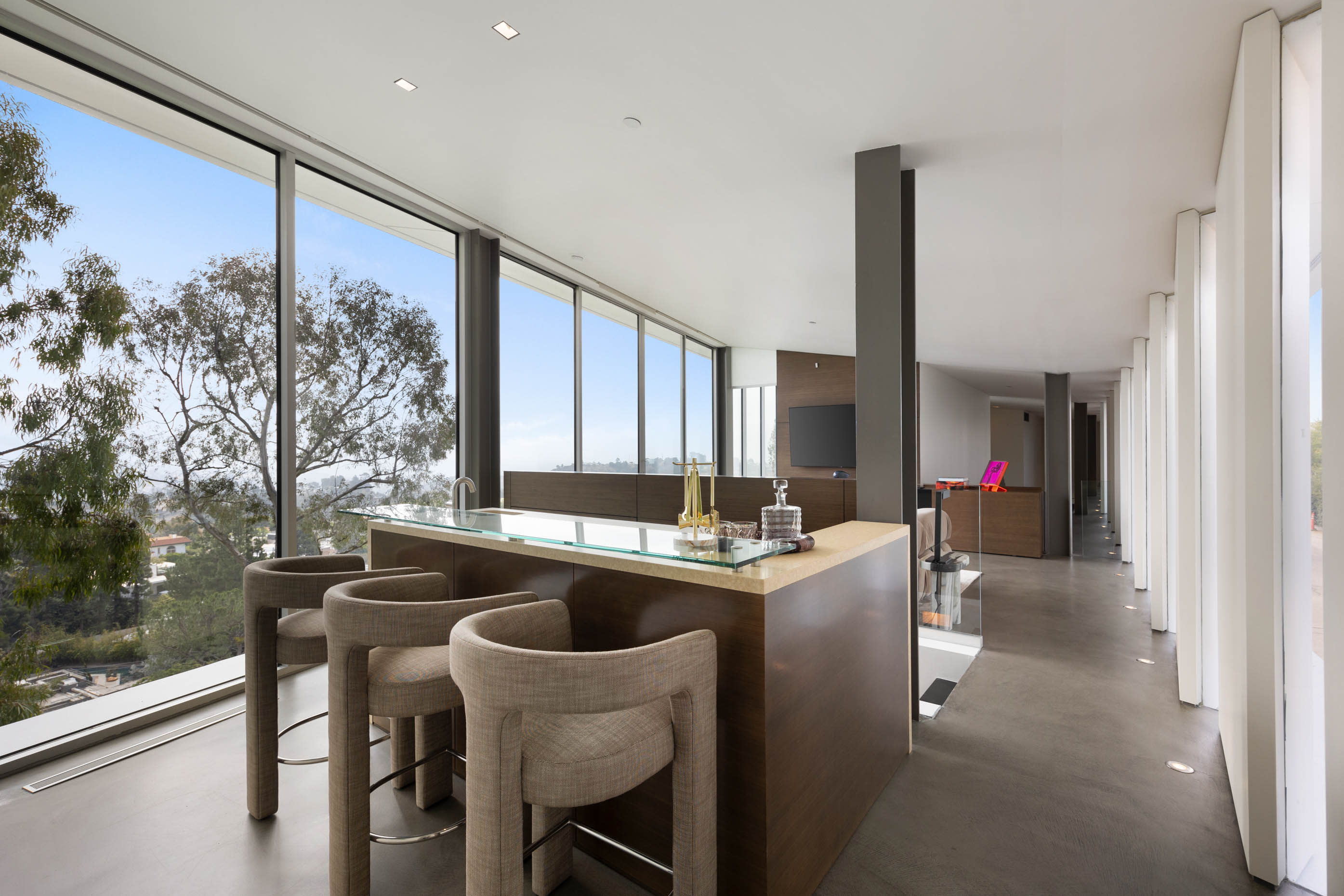 Sophisticated bar area offering premium amenities for a luxurious and refined experience.