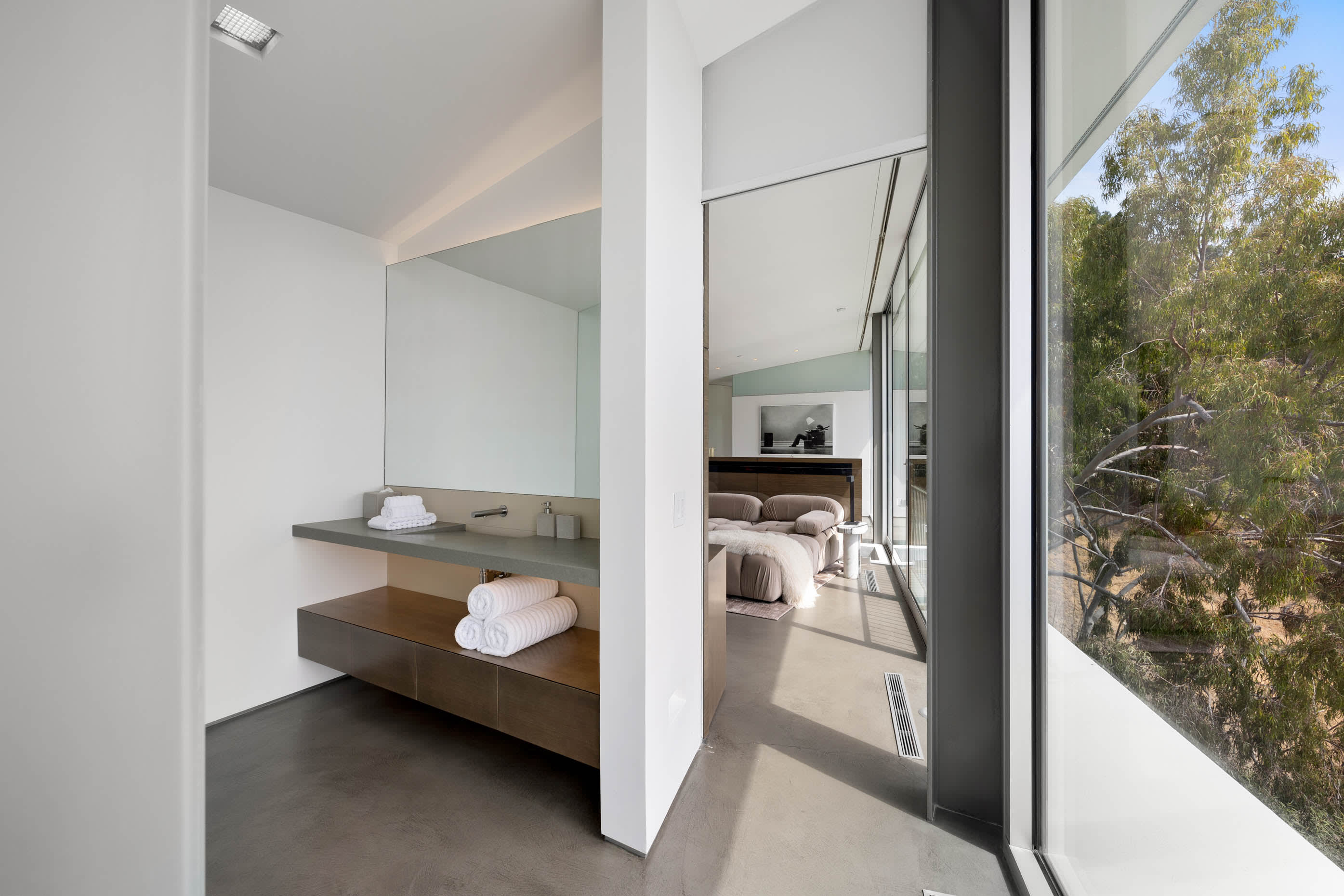 Elegant guest bathroom featuring modern fixtures and refined finishes for a luxurious touch.