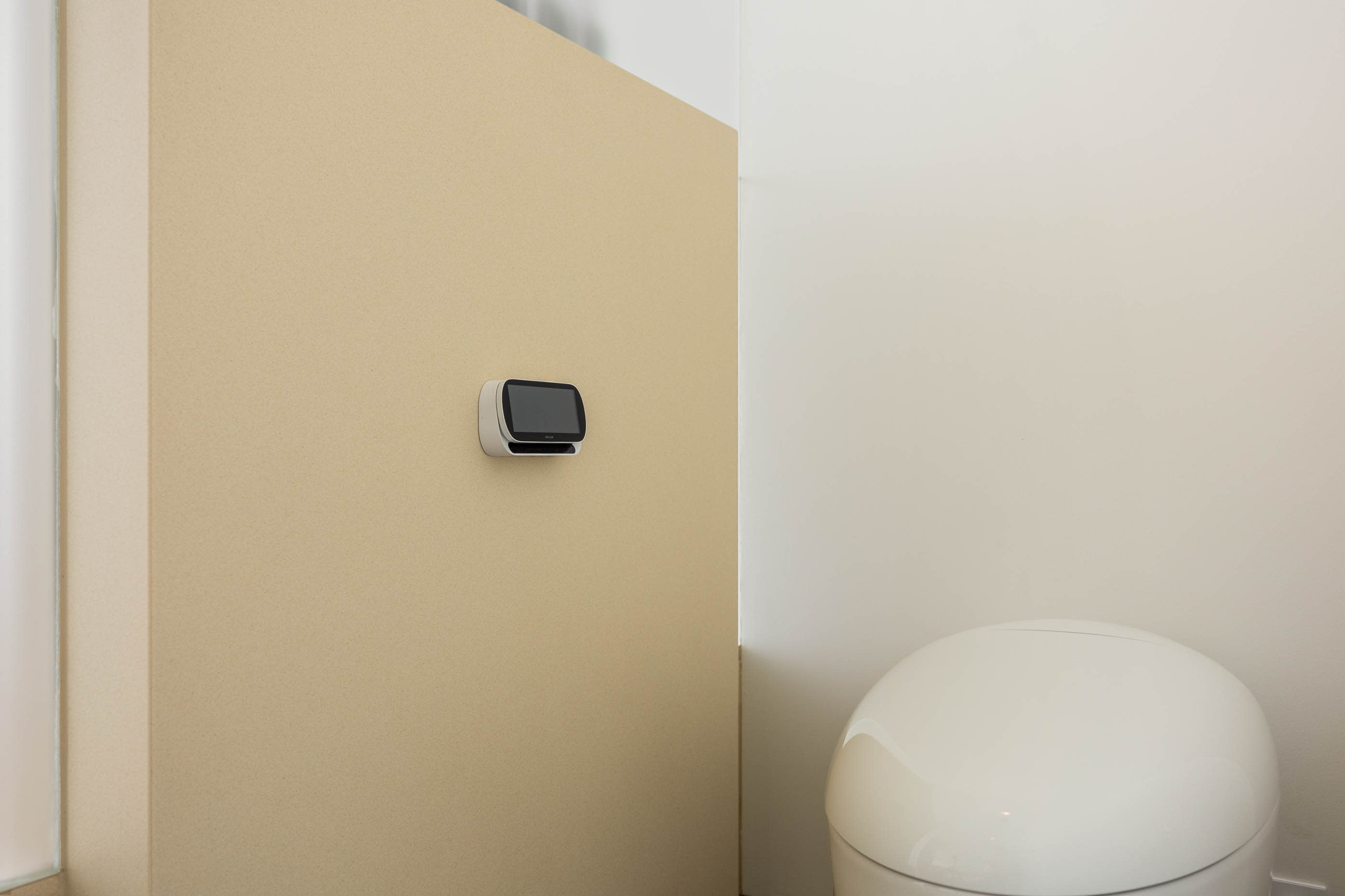 Bathroom equipped with a state-of-the-art smart toilet for an enhanced luxury experience.