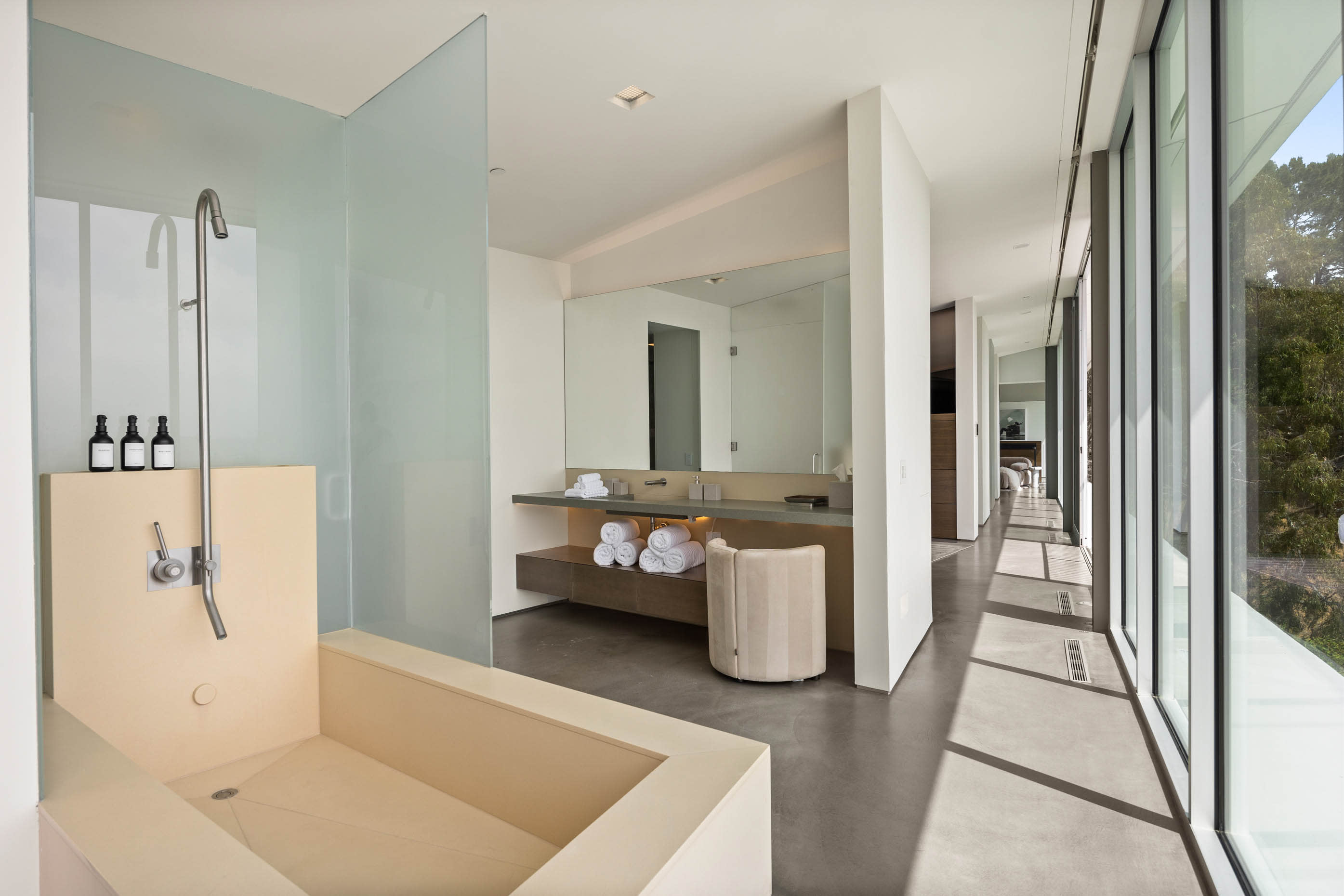 Master bath featuring a massive, uniquely designed deep bathtub and shower for ultimate relaxation.
