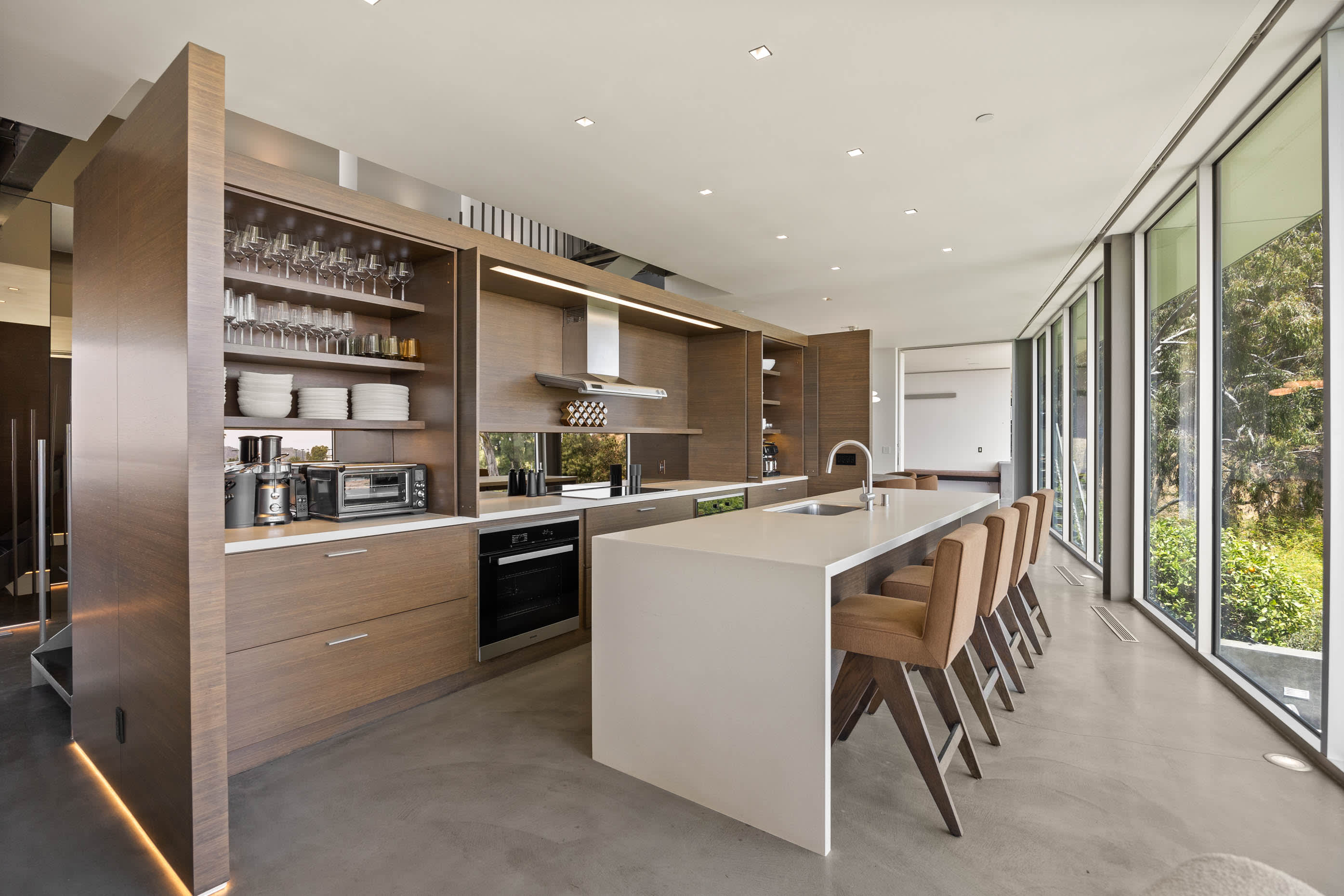 State-of-the-art kitchen, perfect for culinary aficionados with a spacious island for prep work and entertaining.