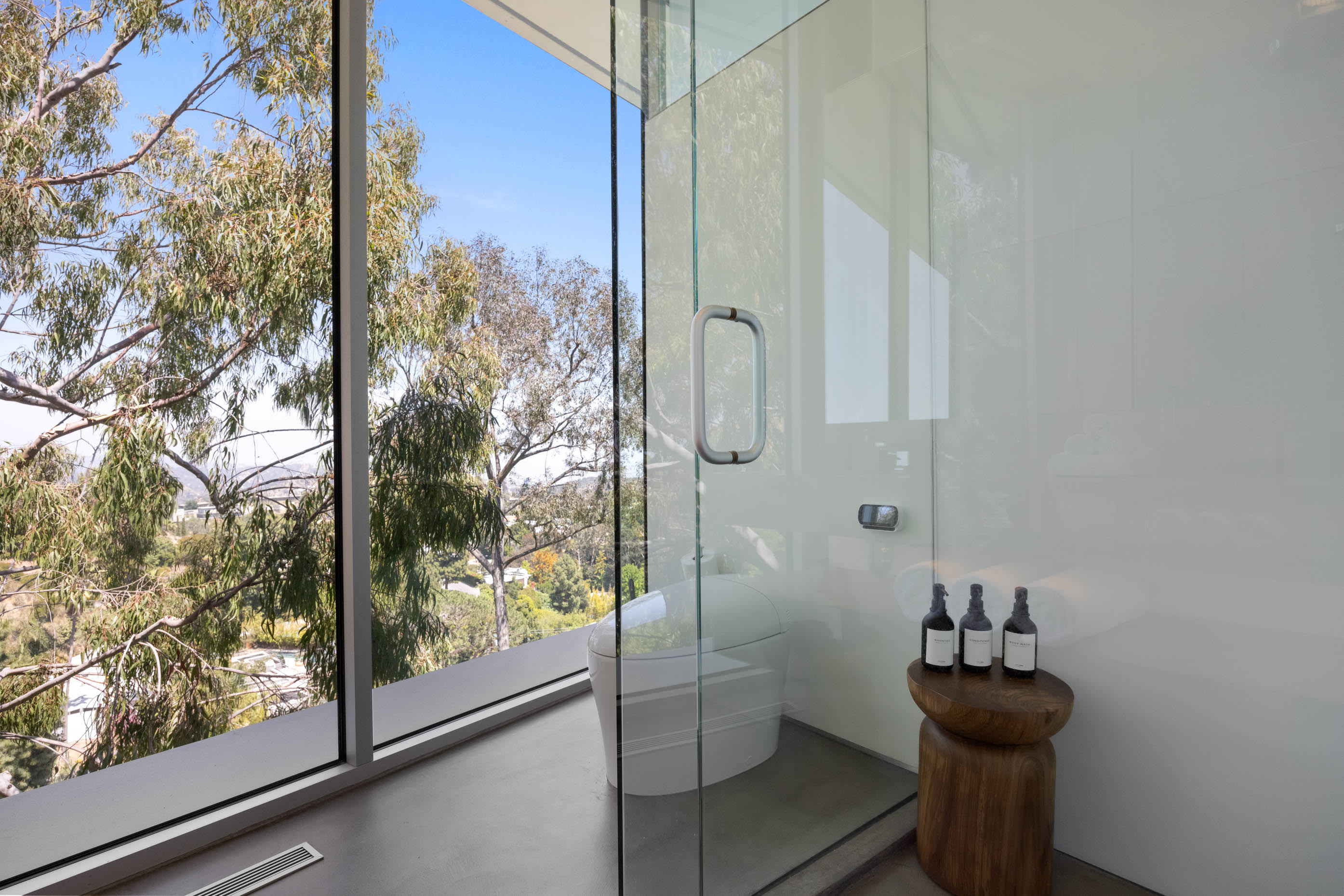 Lavish bathrooms featuring Kohler Karing smart toilets and luxurious amenities.