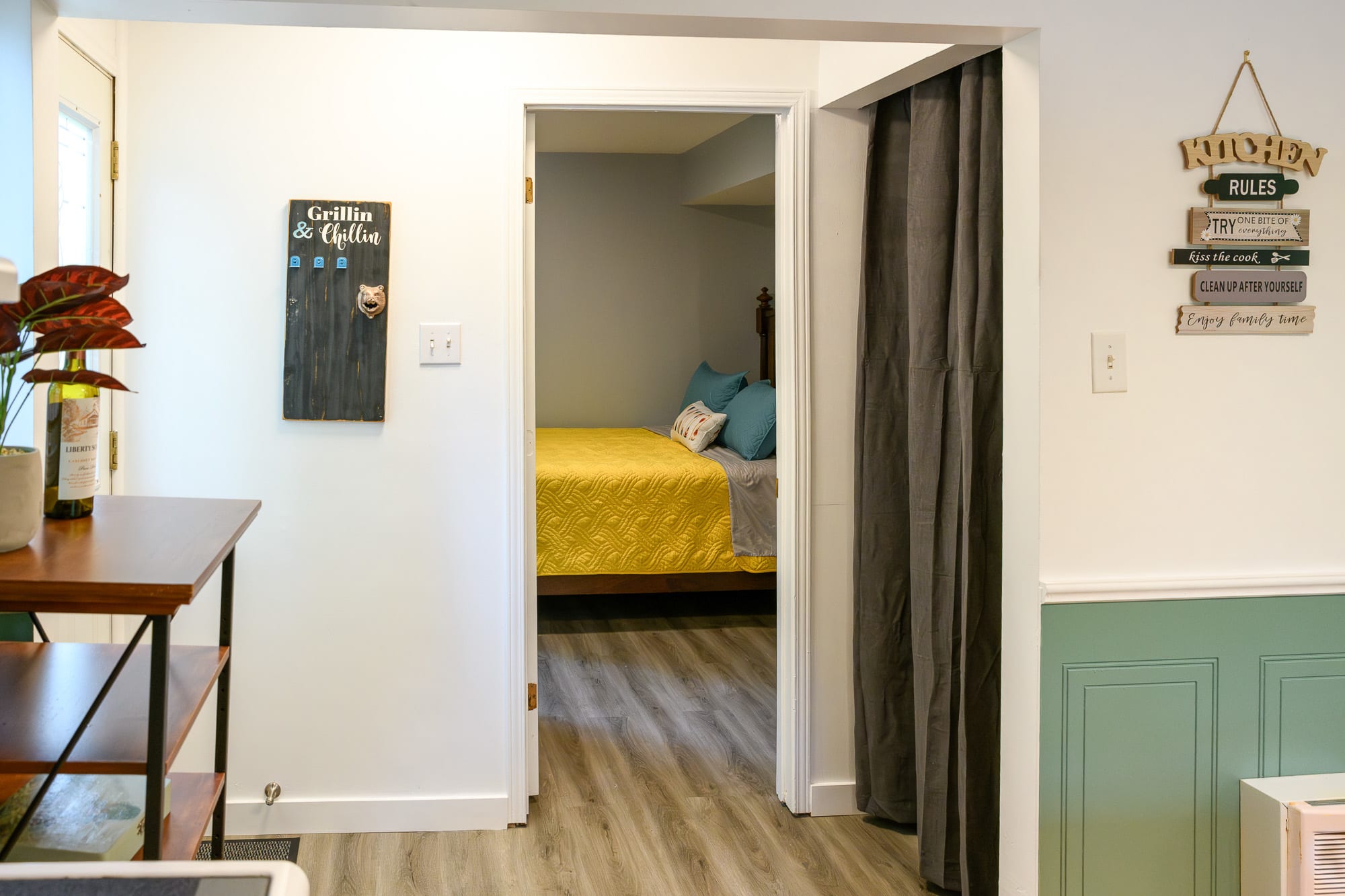 Inviting Entrance To A Cozy Bedroom Featuring A Comfortable Queen Bed