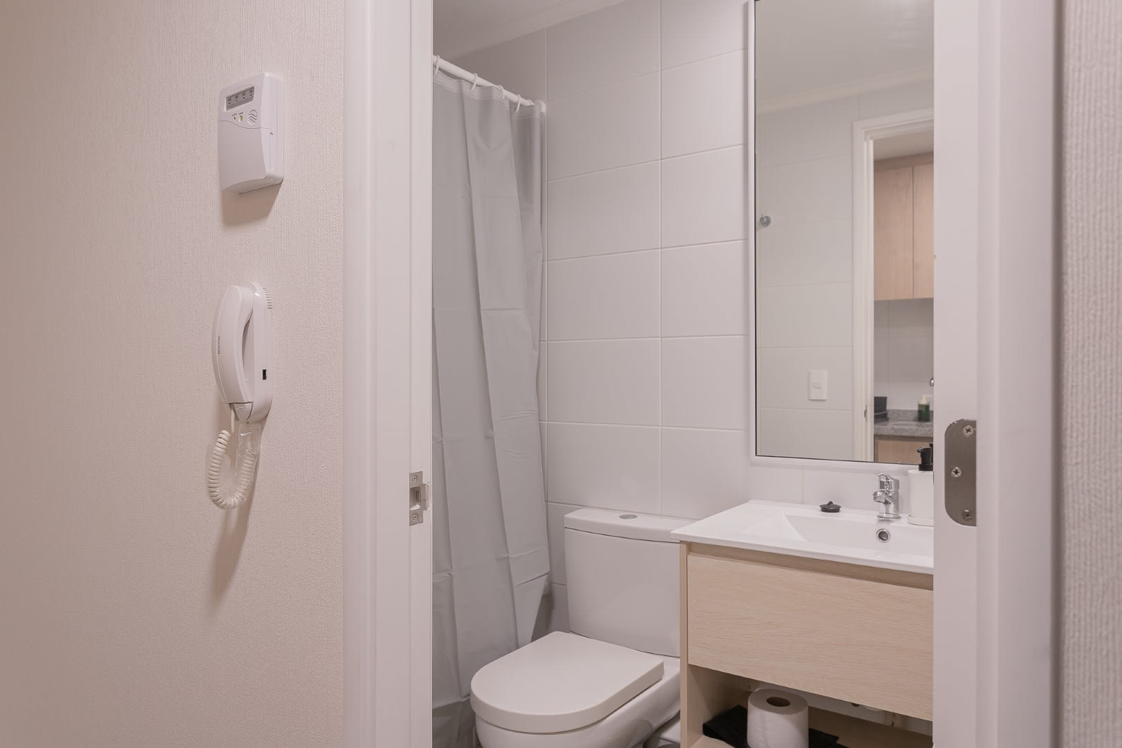 Modern and clean bathroom with sleek fixtures and ample storage, perfect for a refreshing start to your day.