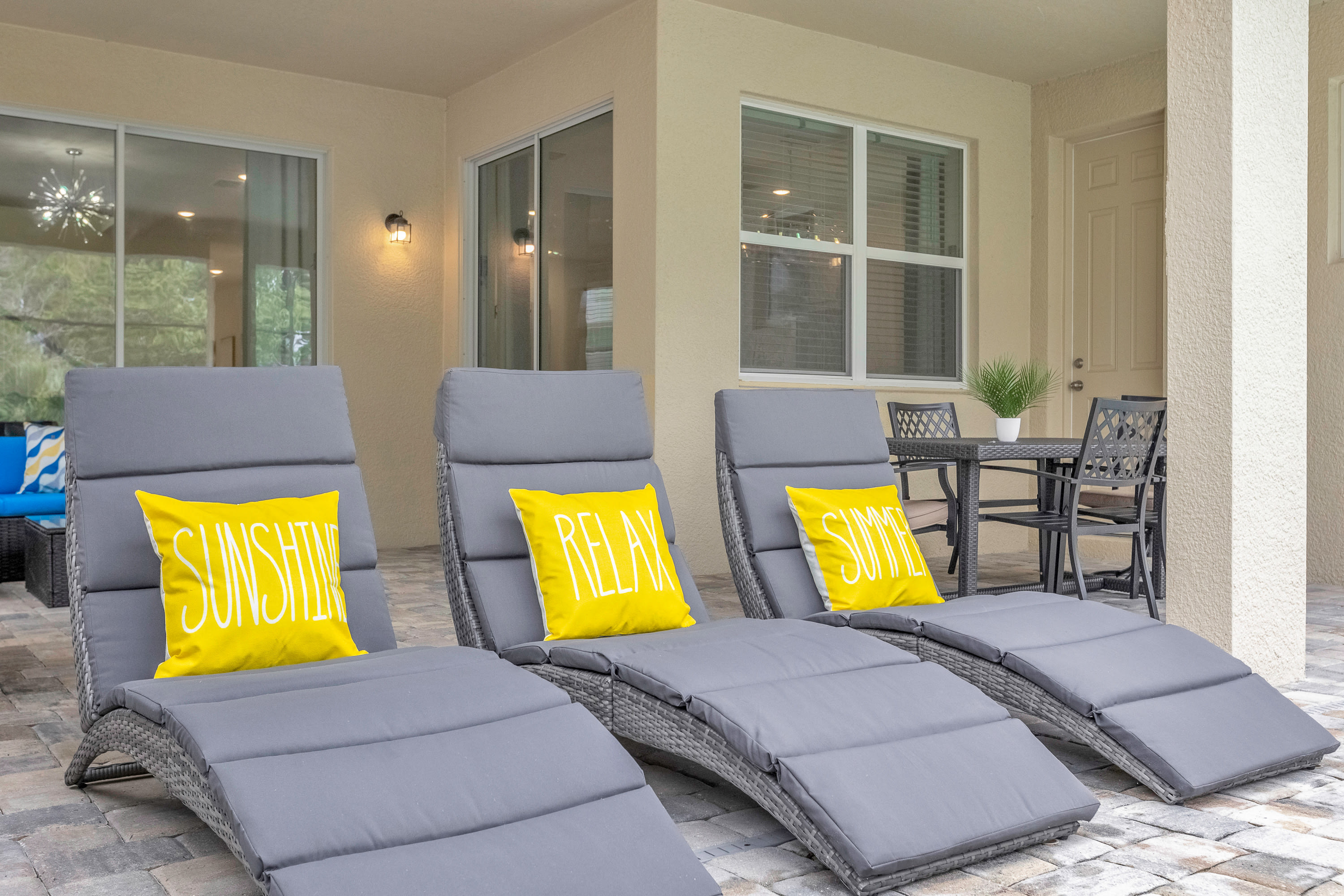 Relax On Comfortable Sun Loungers While Enjoying The Garden View