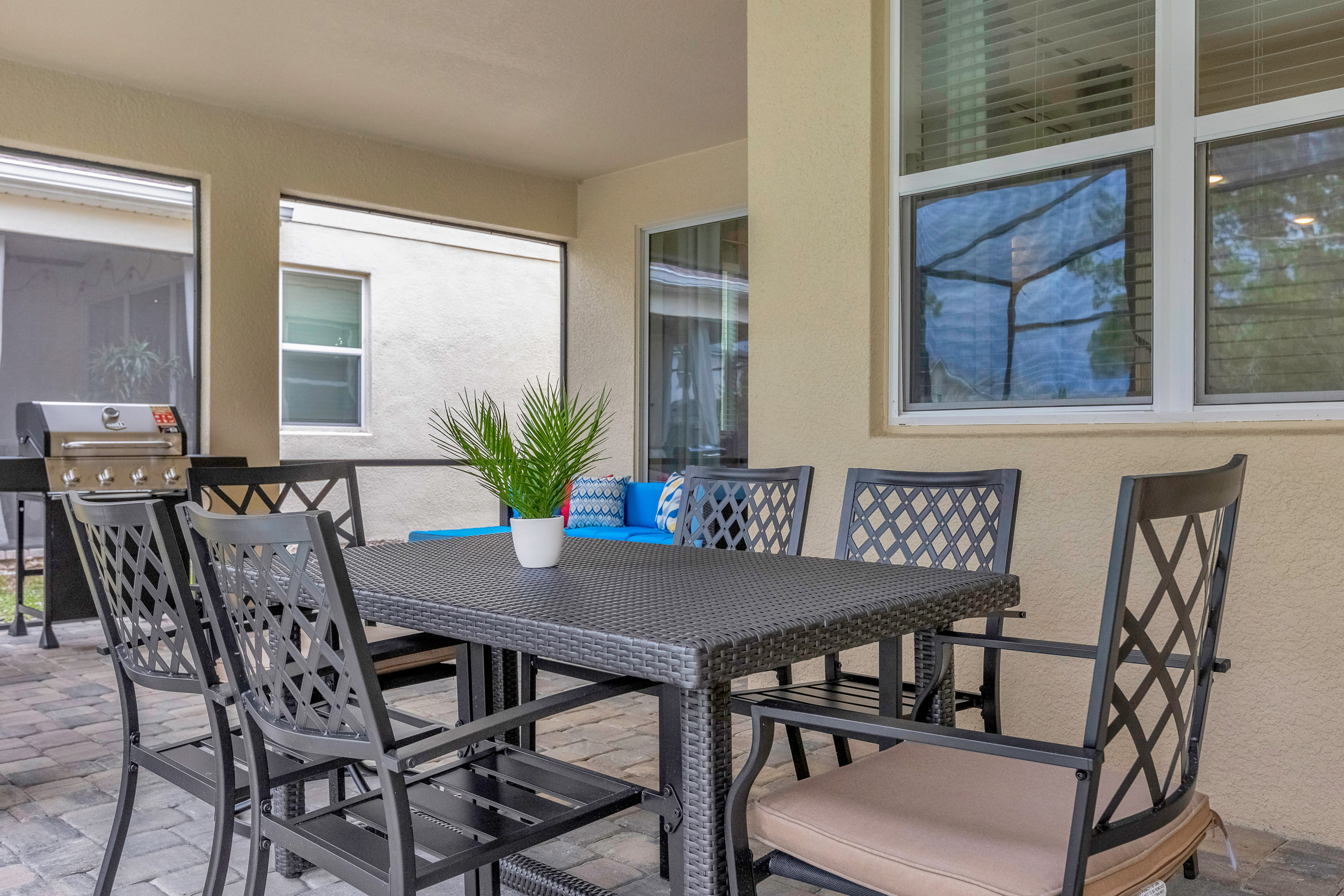 Dine Alfresco Under The Covered Poolside Dining Area