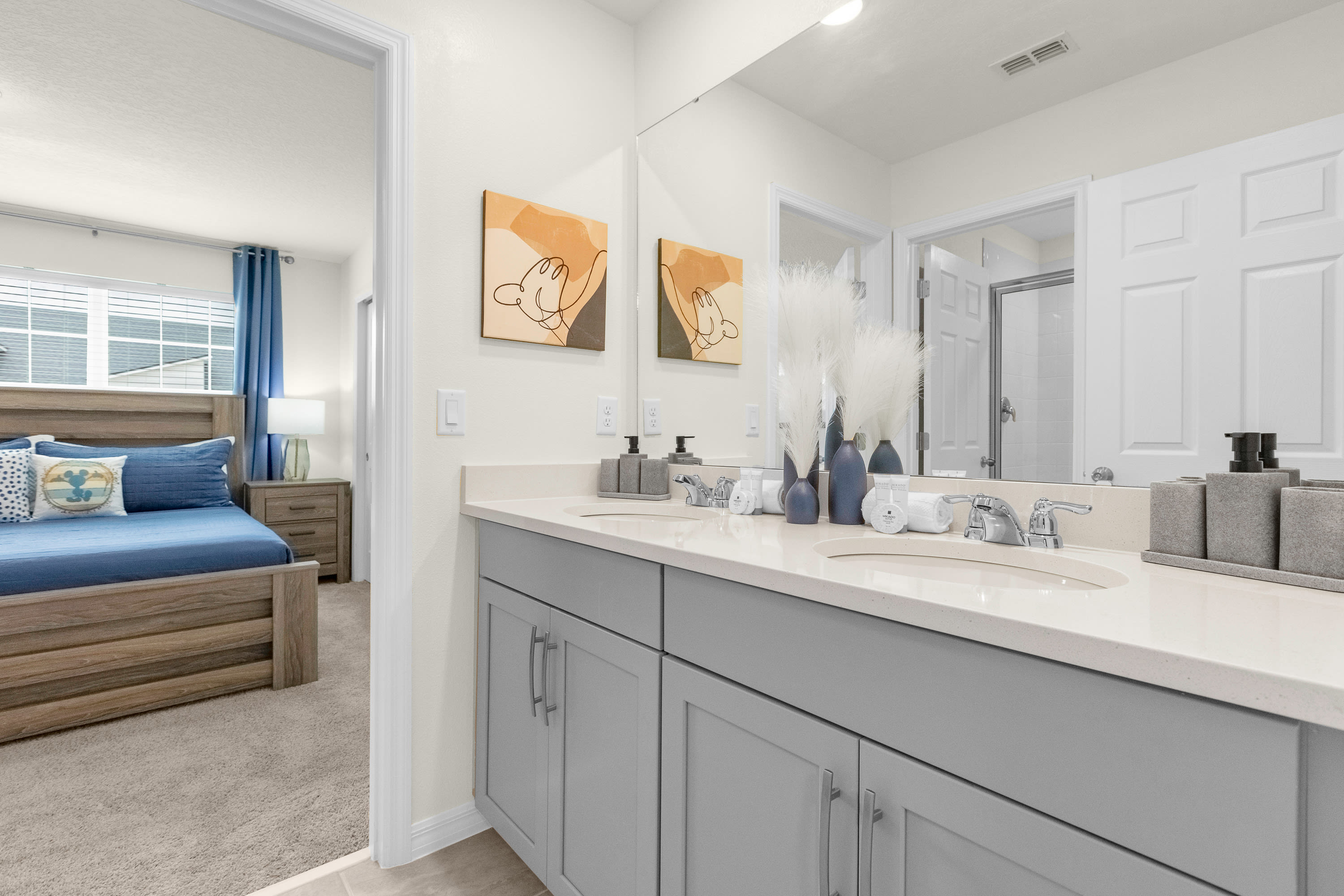 Modern Bathroom With Sleek Vanity And Ample Lighting